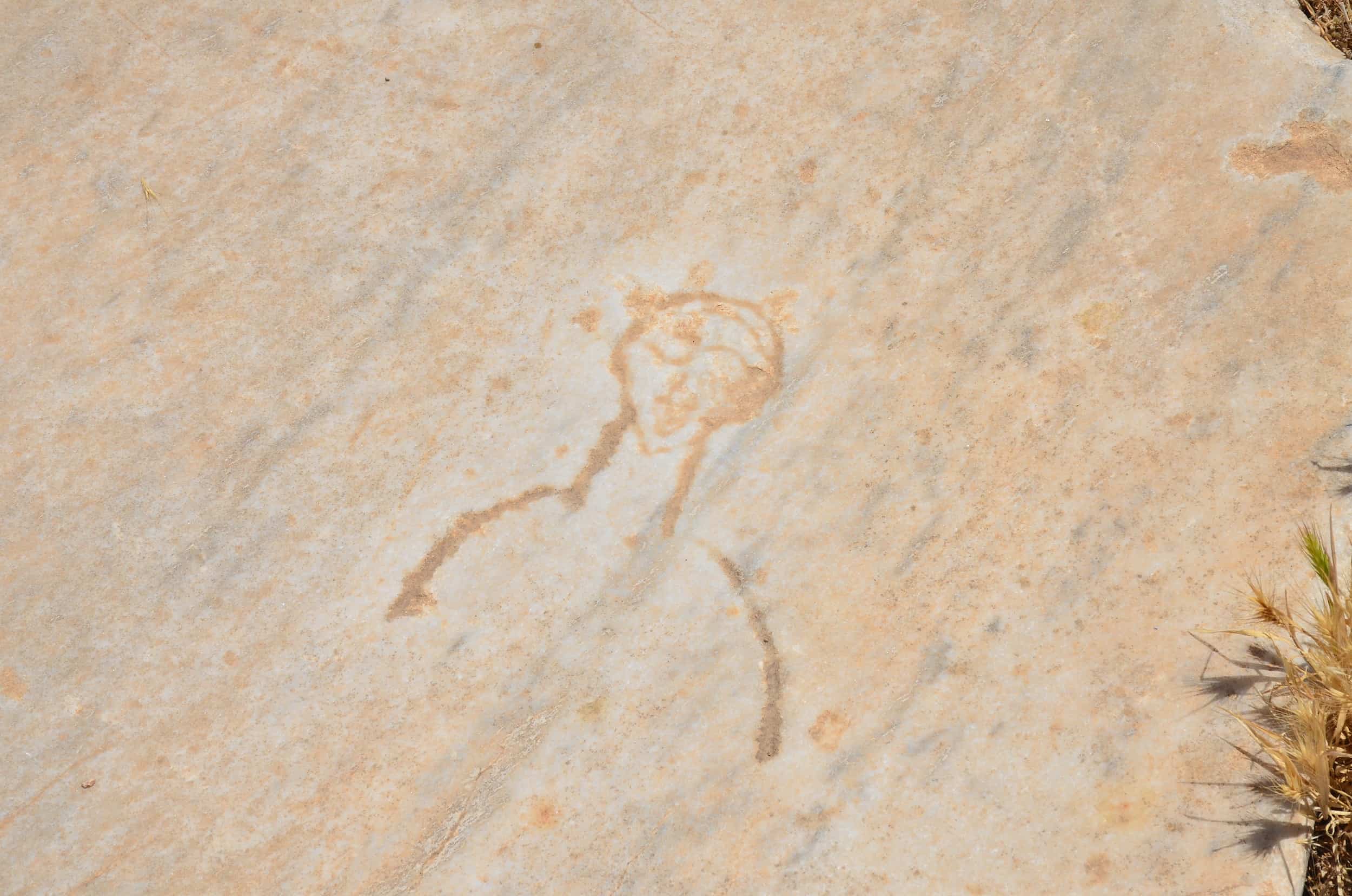 Human figure on the floor in the atrium at the Church of Mary