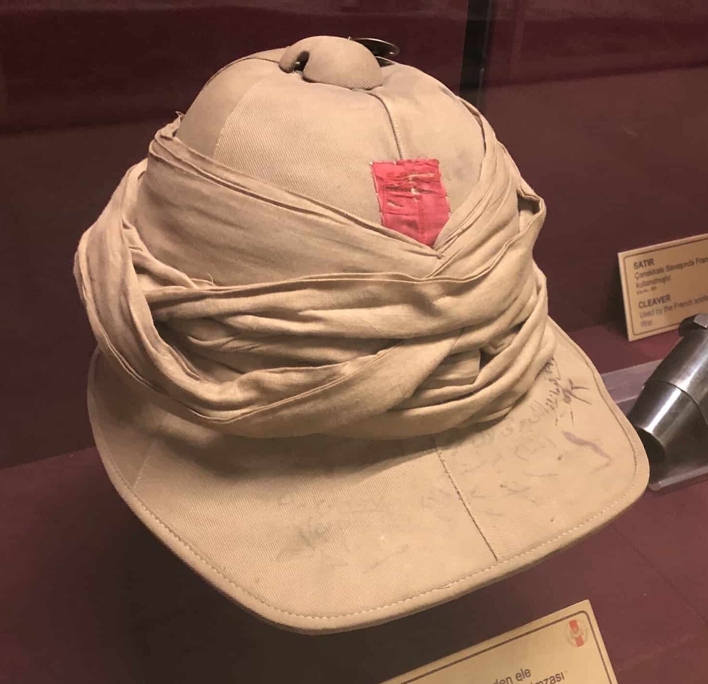 Hat captured from a British soldier at Arıburnu containing Atatürk's signature in the Battle of Dardanelles Hall at the Harbiye Military Museum in Istanbul, Turkey