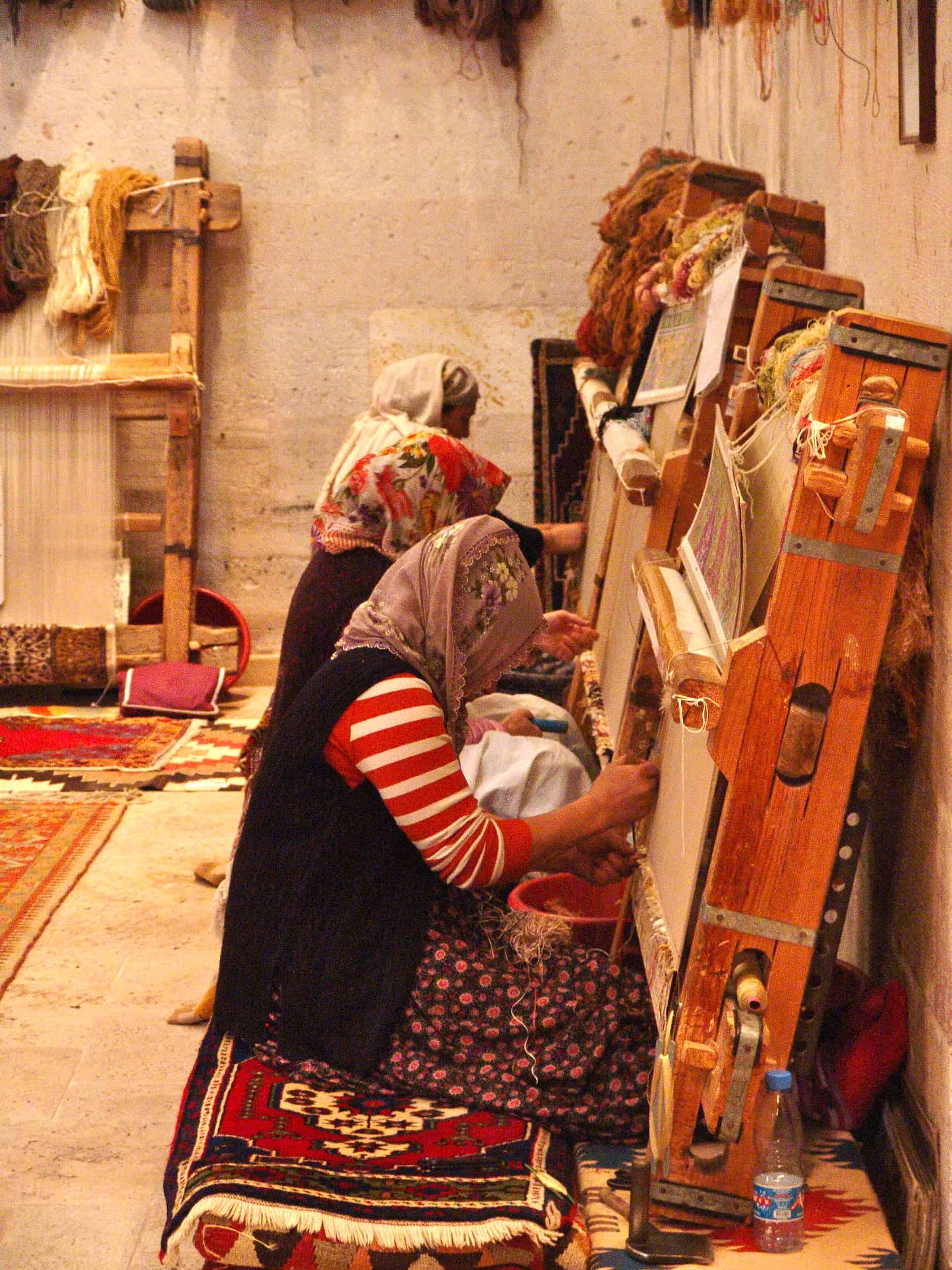 Carpet weavers at Sentez Halı in Avanos, Cappadocia, Turkey