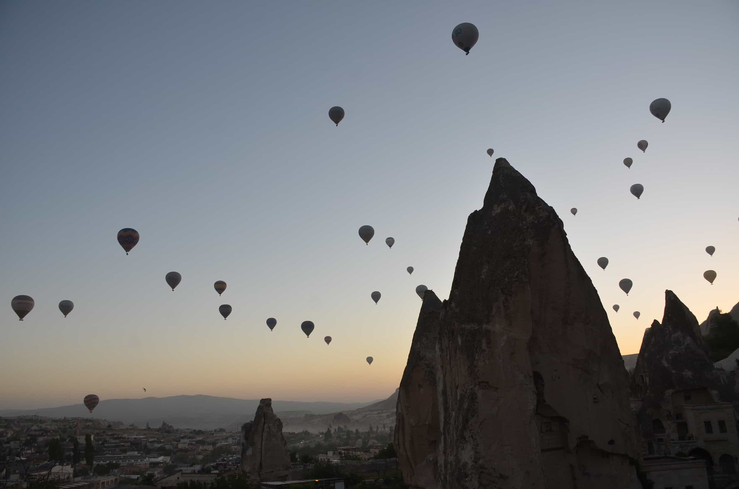 Balloons over Göreme at Anatolian Houses in Göreme, Cappadocia, Turkey