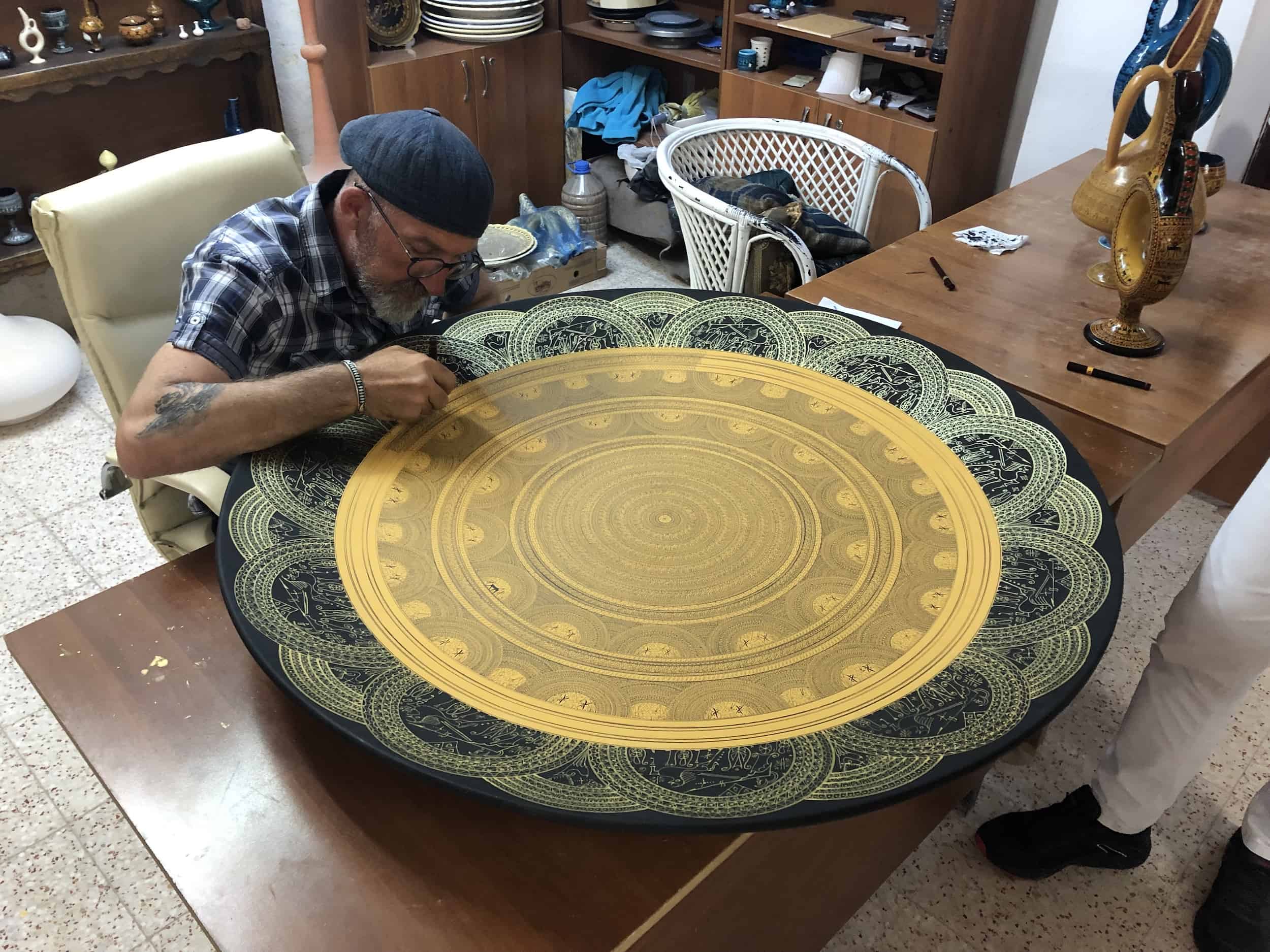 Ceramic artist working on his masterpiece at Venessa Seramik in Avanos, Cappadocia, Turkey
