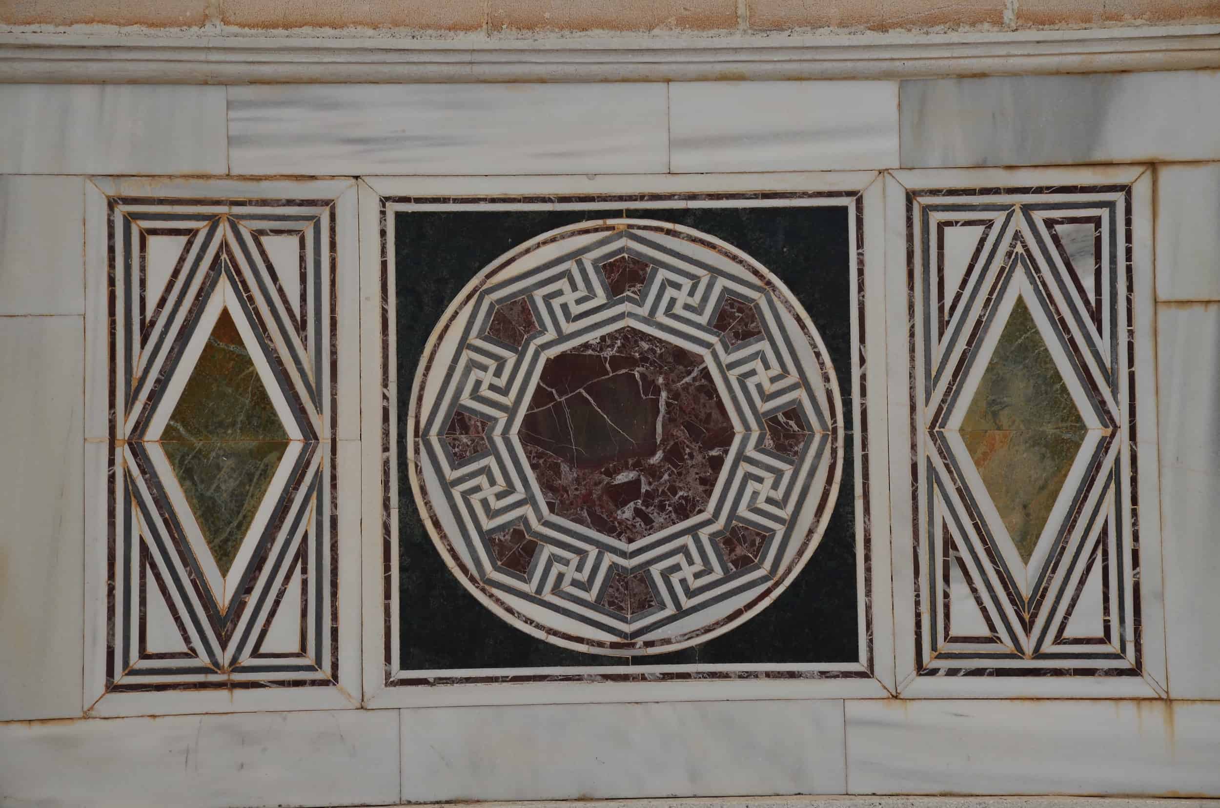 Marble panel on the south wall in the main hall of the Sardis Synagogue