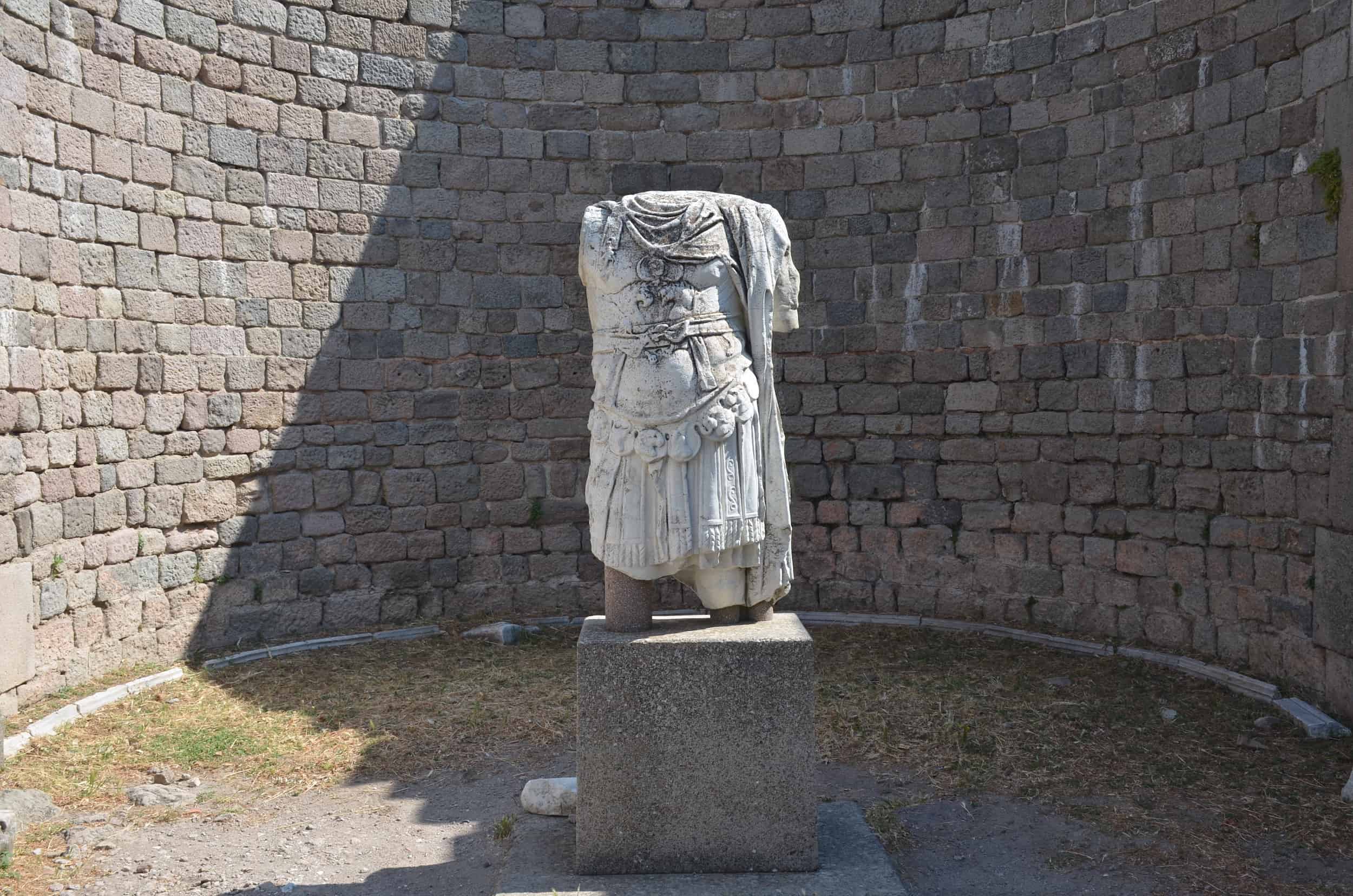 Replica statue in the right stoa of the Temple of Trajan