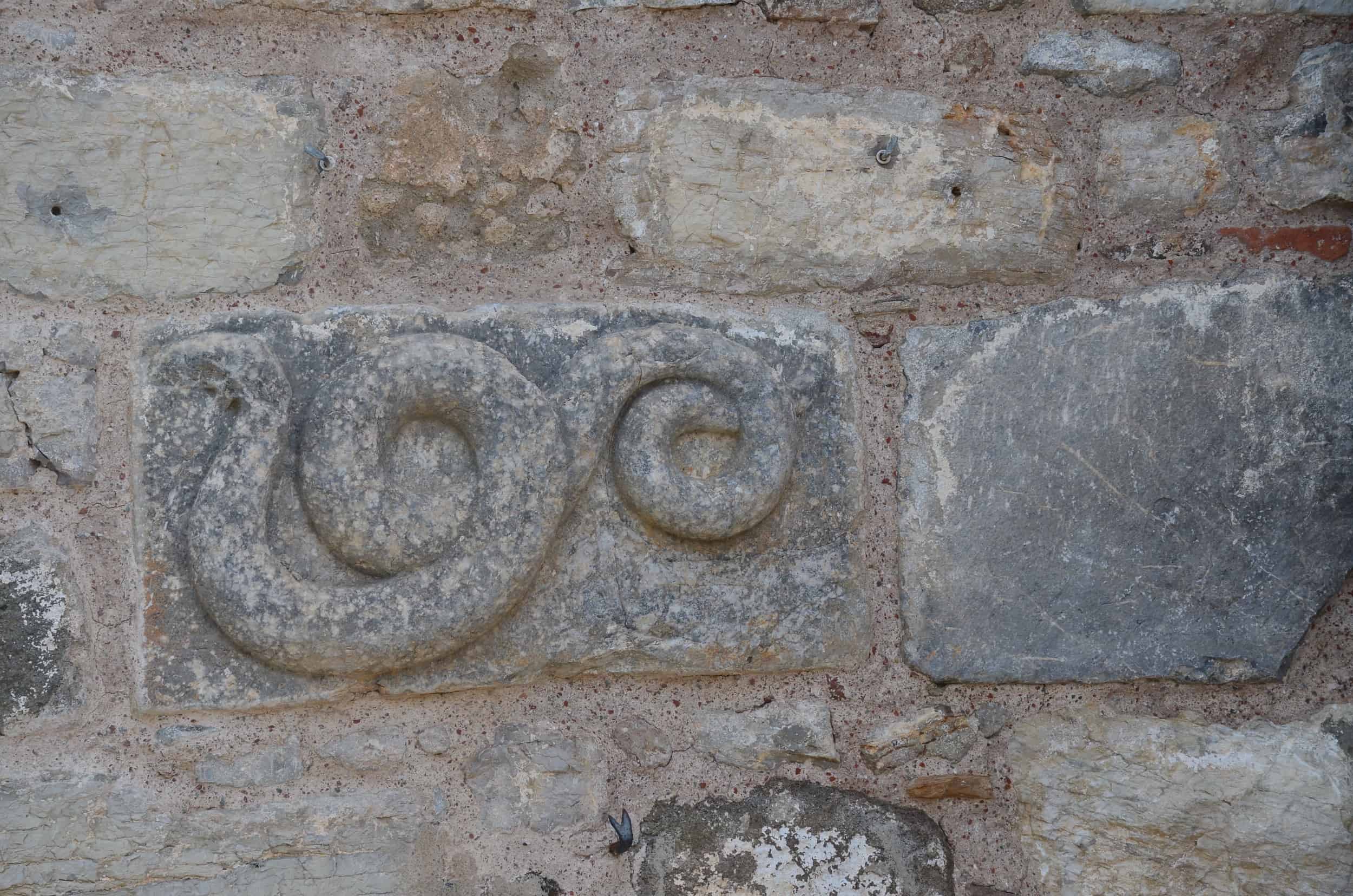 Snake carving on the Spanish Tower at Bodrum Castle in Turkey