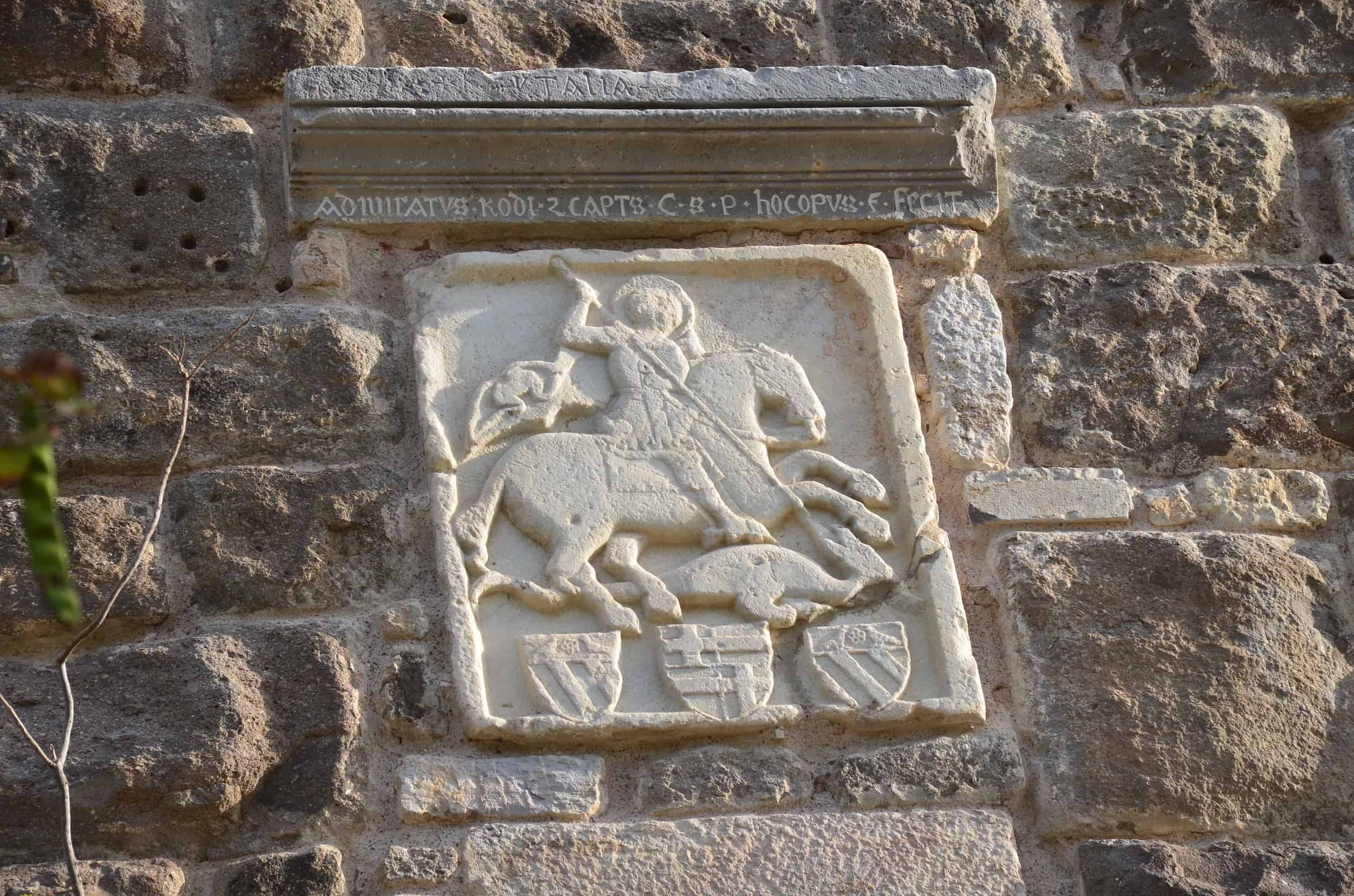 Relief of Saint George with the coat of arms of Angelo Mascettola below on the Italian Tower