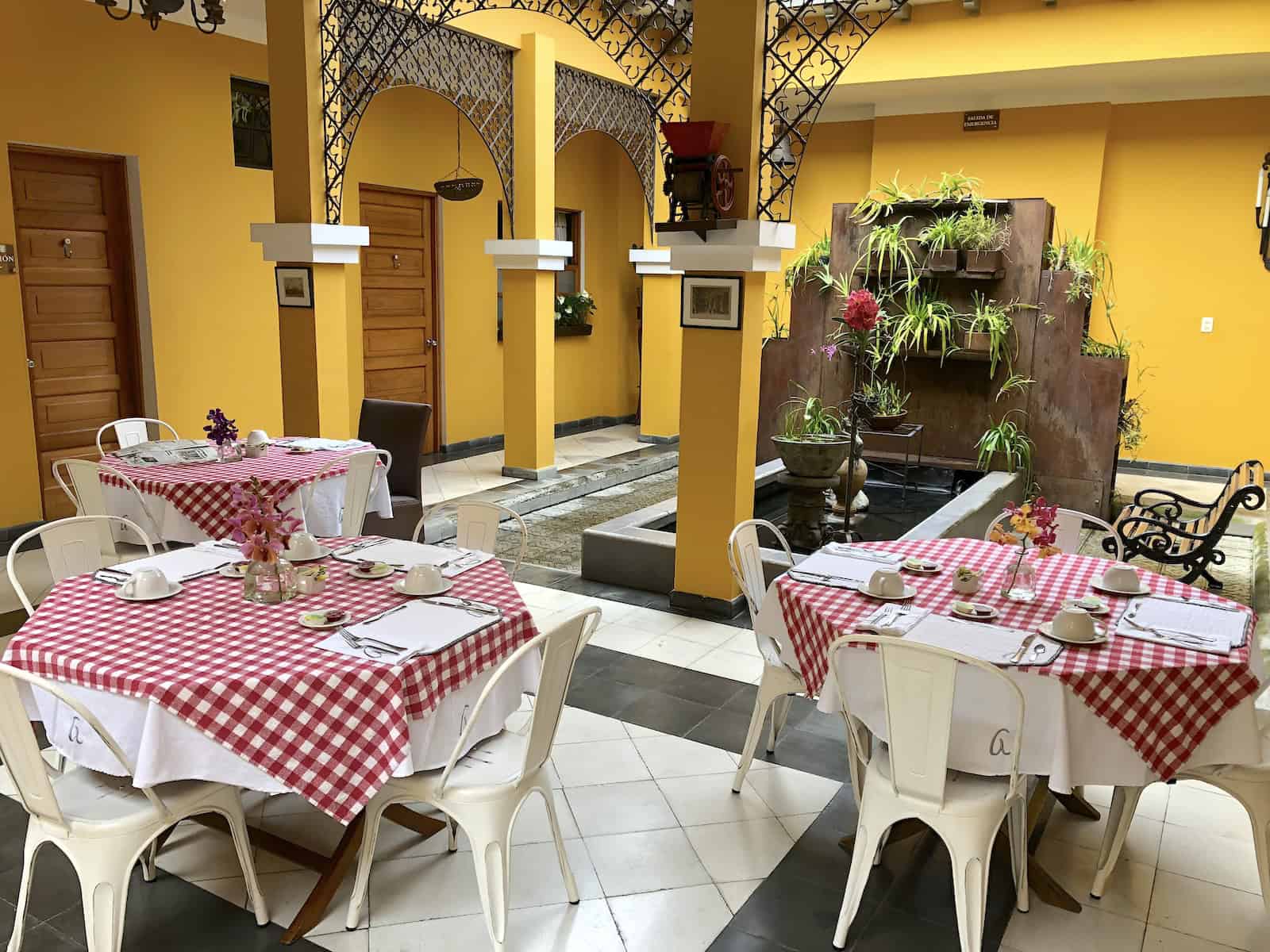 Breakfast area at Hotel Boutique Don Alfonso in Pereira, Risaralda, Colombia