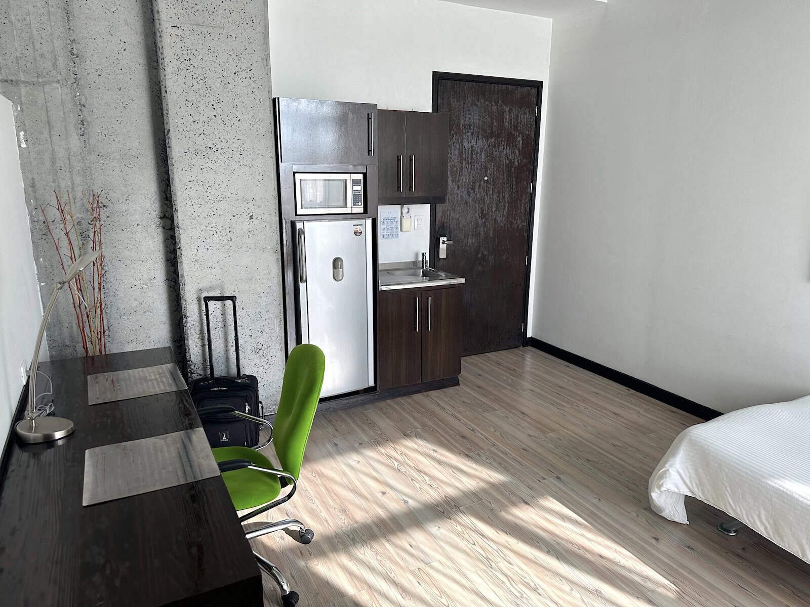 Kitchenette and work station at Habitat Suites Hotel