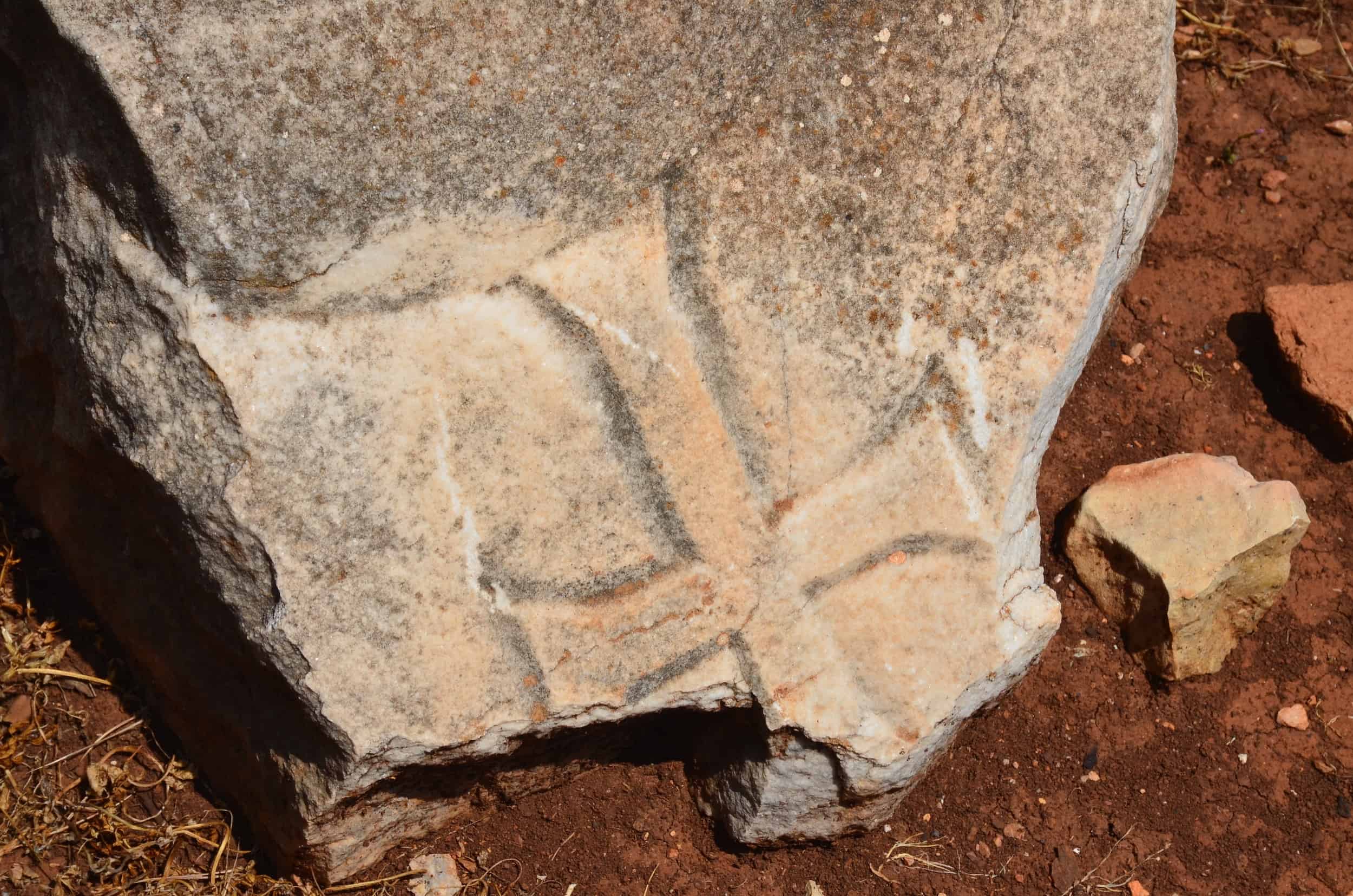 Cross on a column capital at the Big Basilica on Sedir Island, ancient Kedreai, Turkey