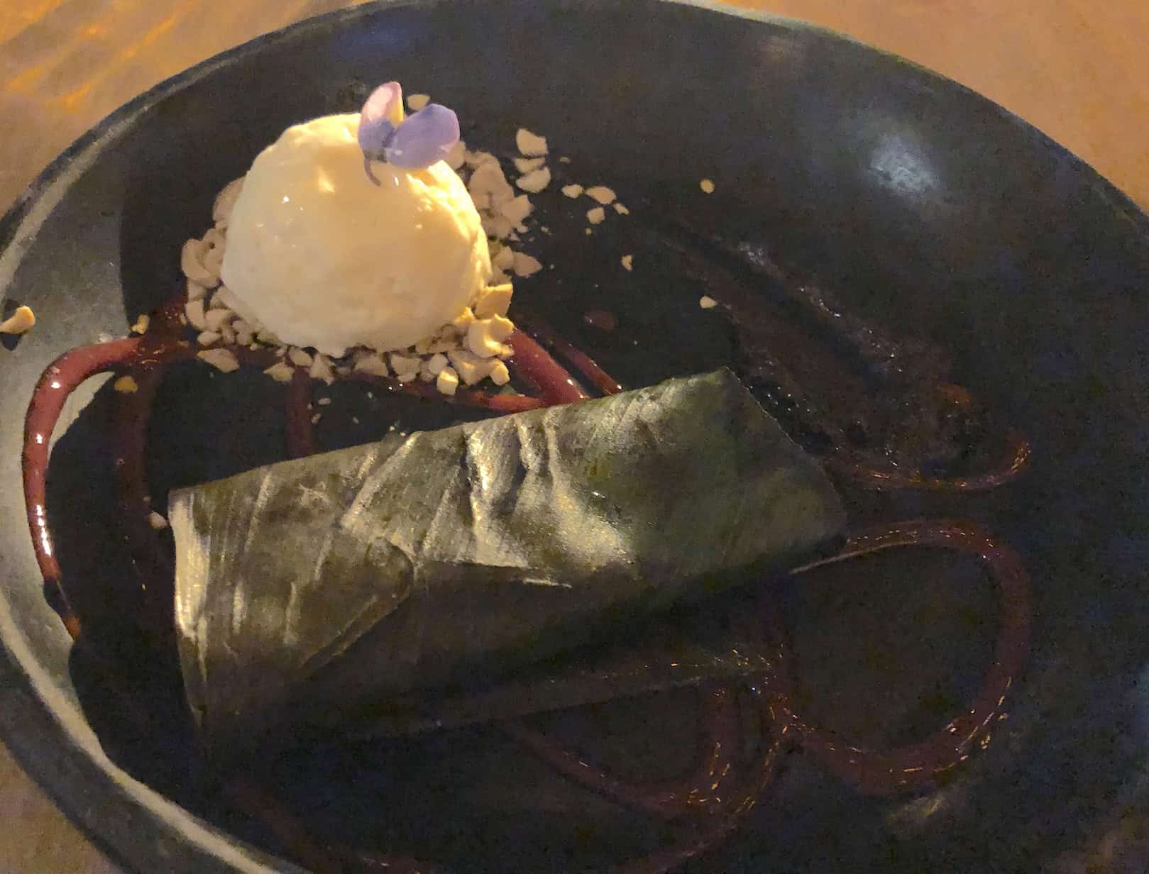 Brownie wrapped in a leaf served with ice cream at La Chagra in El Poblado, Medellín, Antioquia, Colombia