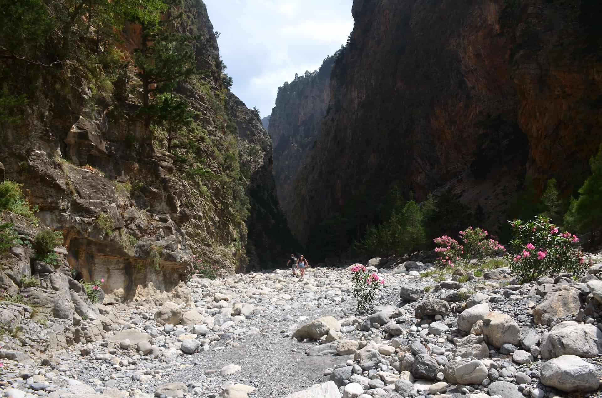 Walking on the riverbed on the trail from Nero tis Perdikas to Christos at the Samaria Gorge in Crete, Greece
