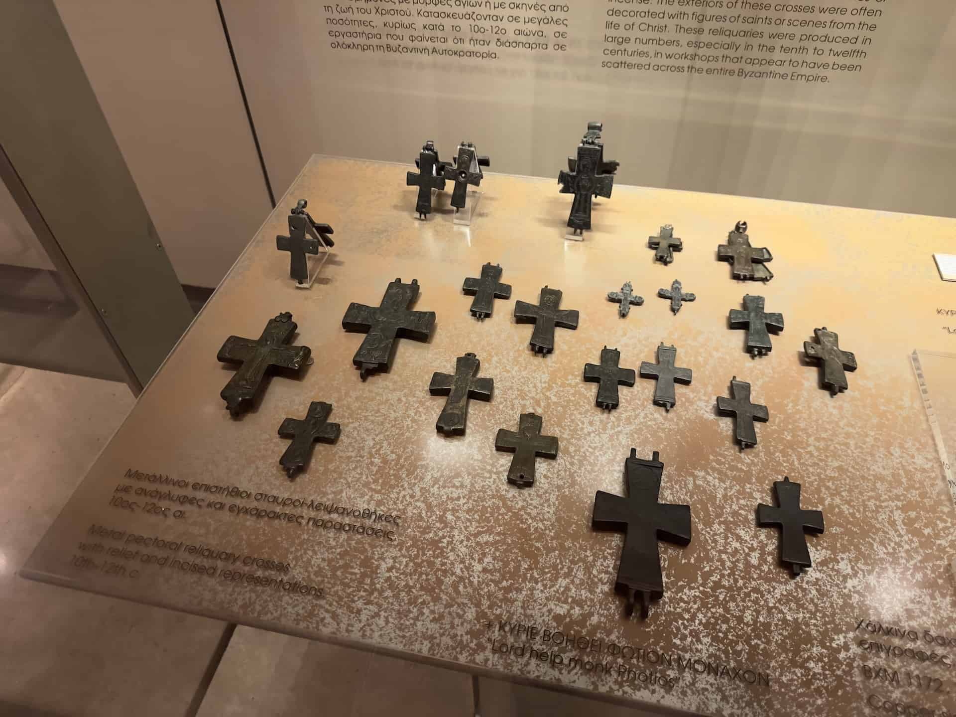 Metal pectoral reliquary crosses with relief and incised representations, 10th-12th century at the Byzantine Museum in Athens, Greece