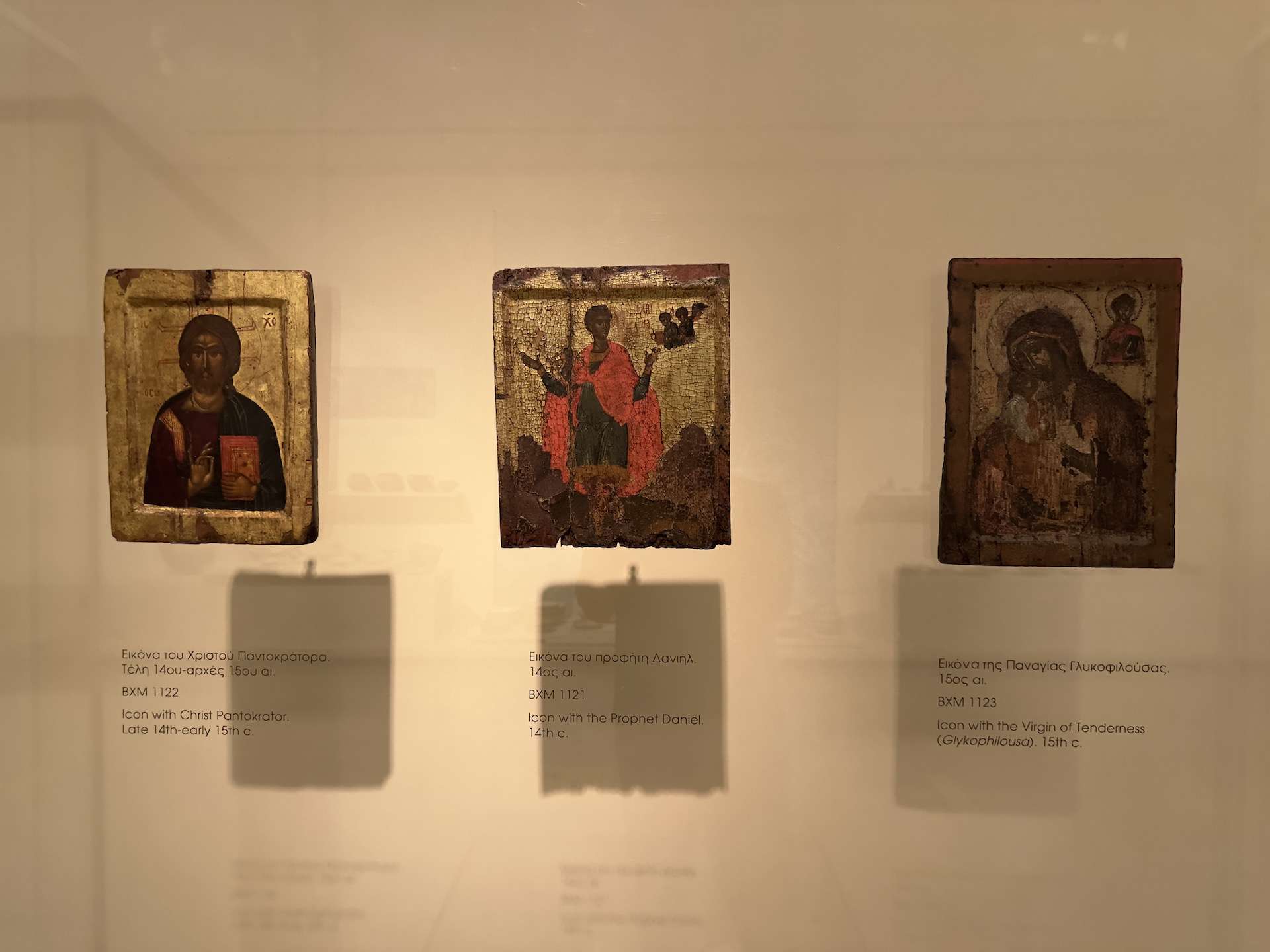 Icon with Christ Pantocrator, late 14th-early 15th century (left); Icon with the Prophet Daniel, 14th century (center); Icon with the Virgin of Tenderness (Glykophilousa), 15th century (right) at the Byzantine Museum in Athens, Greece