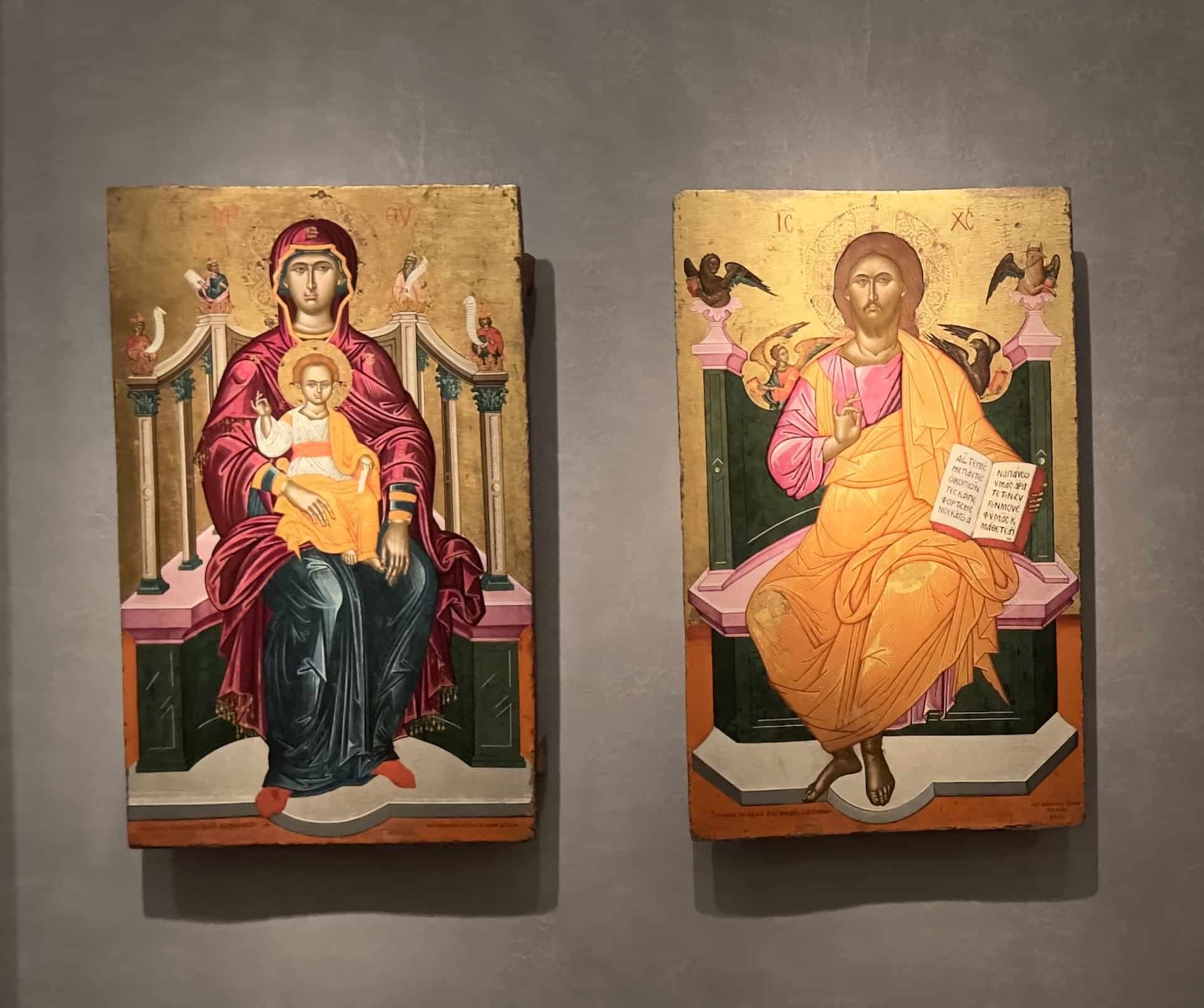 Icon with the Virgin enthroned and child (left); Icon with Christ enthroned (right); both painted by Emmanuel Tzanes, Venice, 1664 at the Byzantine Museum in Athens, Greece
