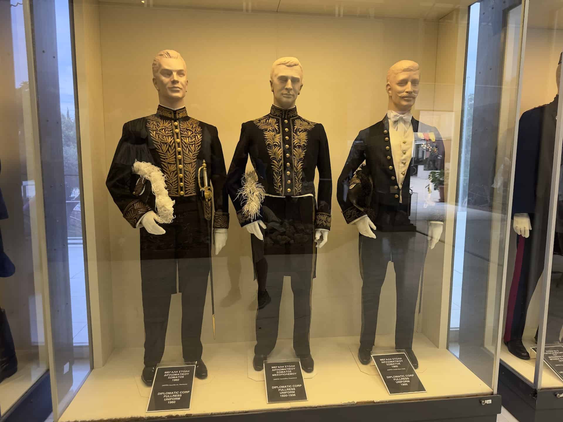 Diplomatic corps full dress uniform, 1960 (left); Diplomatic corps full dress uniform, 1920-1936 (center); Diplomatic corps full dress uniform, 1900 (right) at the War Museum in Athens, Greece
