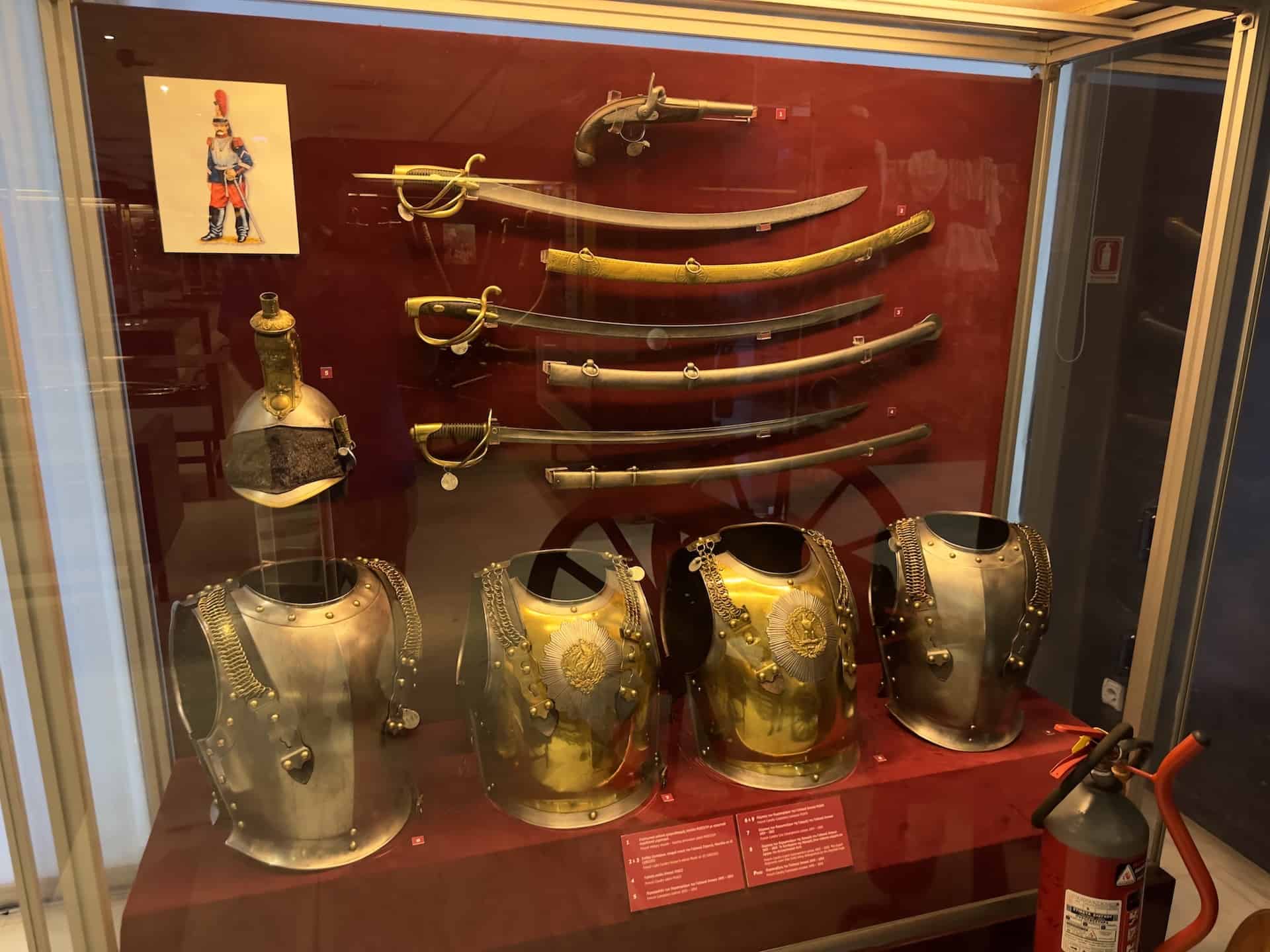 French sabers, helmet, and armor, 19th century in the weapons gallery at the War Museum in Athens, Greece