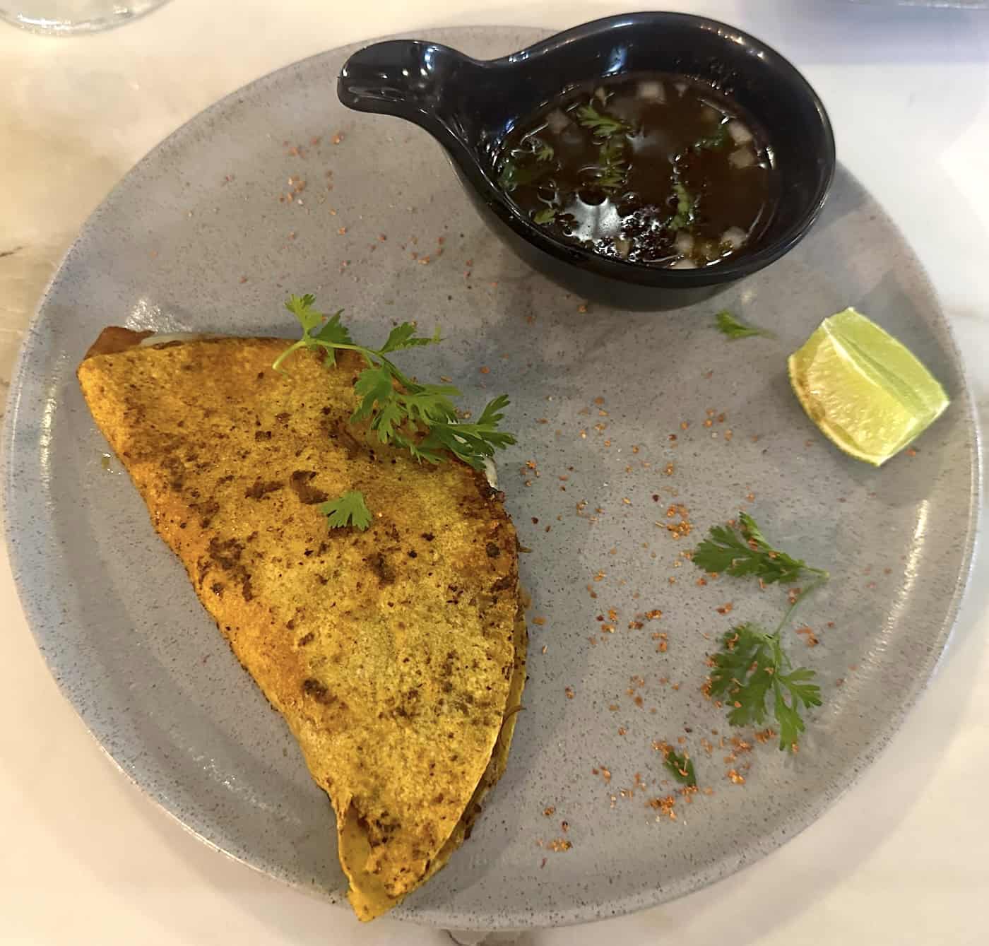 Birria taco at Aura Food Hall & Market in Pereira, Risaralda, Colombia