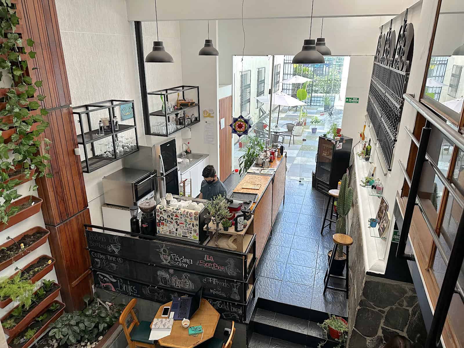 Coffee bar with the patio in the background at Brujas Café in Pereira, Risaralda, Colombia