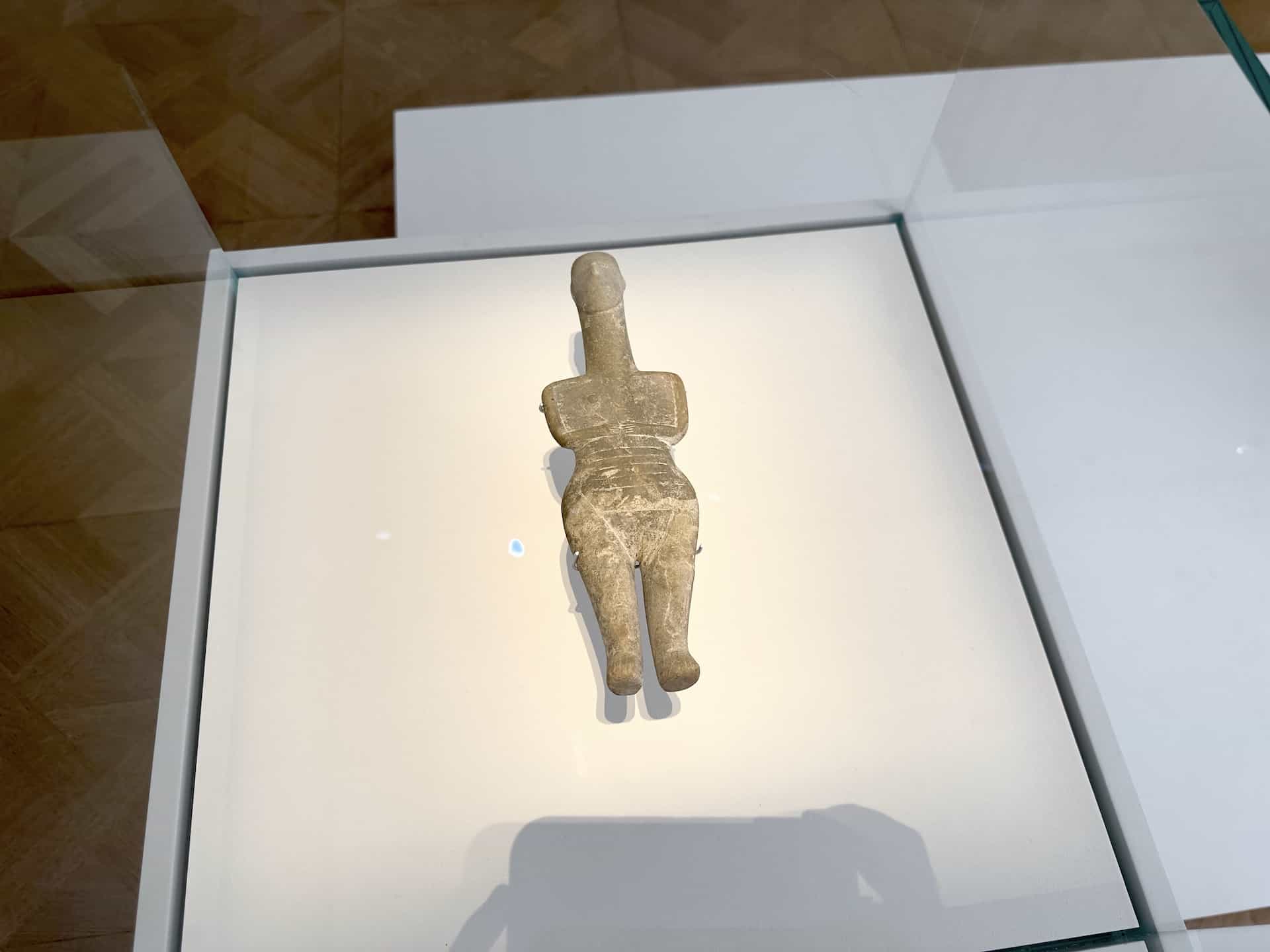 Figurine in Homecoming in the Stathatos Mansion at the Museum of Cycladic Art in Athens, Greece