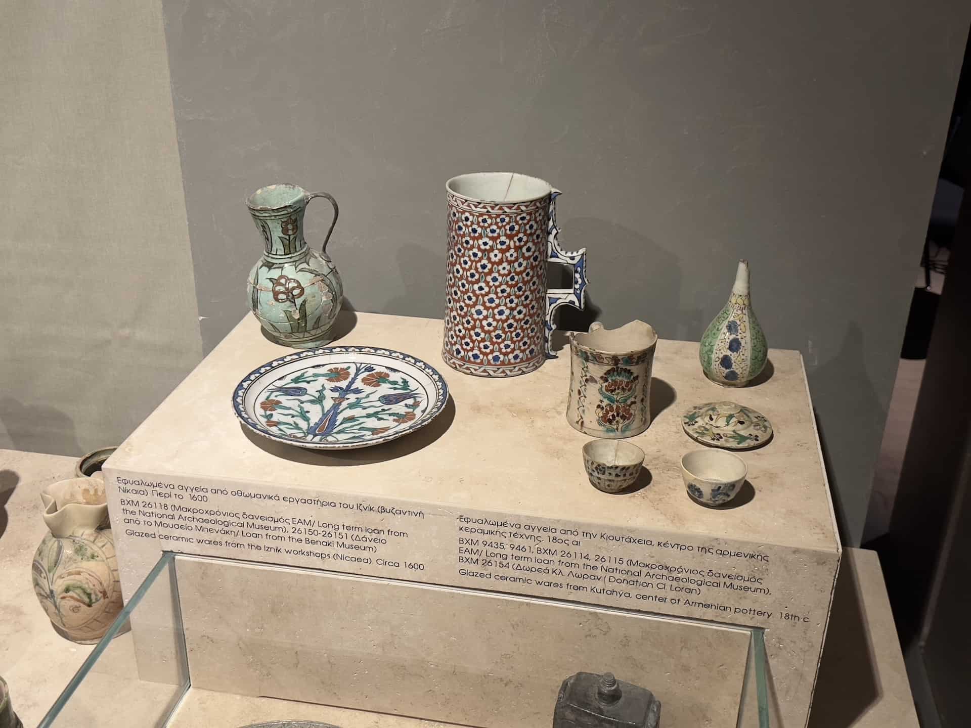 Glazed ceramic wares from Iznik workshops, c. 1600 (left); Glazed ceramic wares from Kütahya, center of Armenian pottery, 18th century (right) at the Byzantine Museum in Athens, Greece