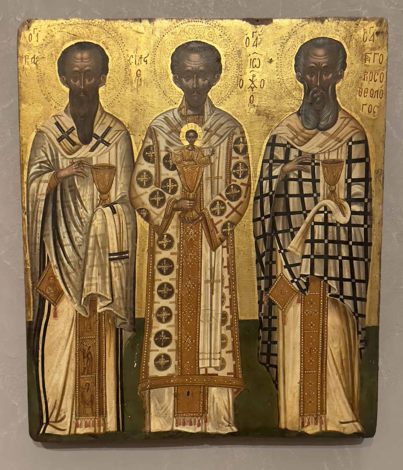 Icon with a depiction of the Three Hierarchs and a Holy Communion chalice, from the Church of Saint Gerasimos in Argostoli, 18th century at the Byzantine Museum in Athens, Greece
