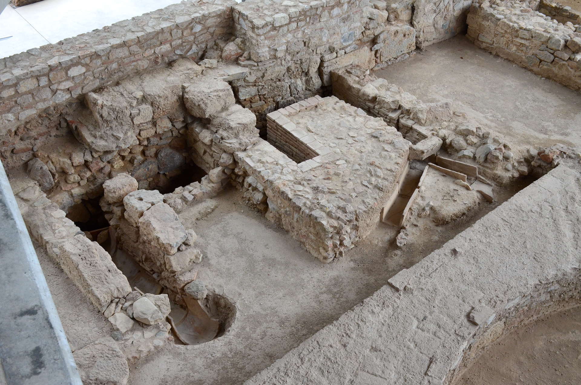 Public latrines in the archaeological site at the Acropolis Museum in Athens, Greece