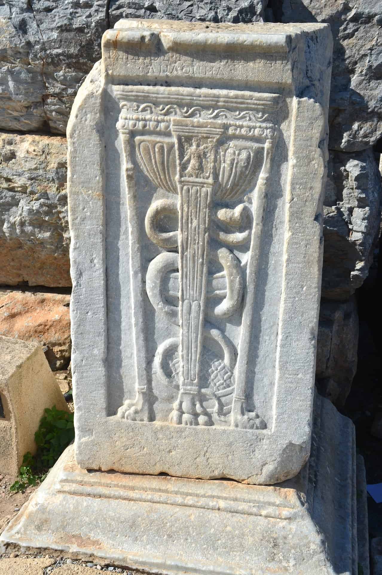 Caduceus on a pillar next to the hospital in Ephesus