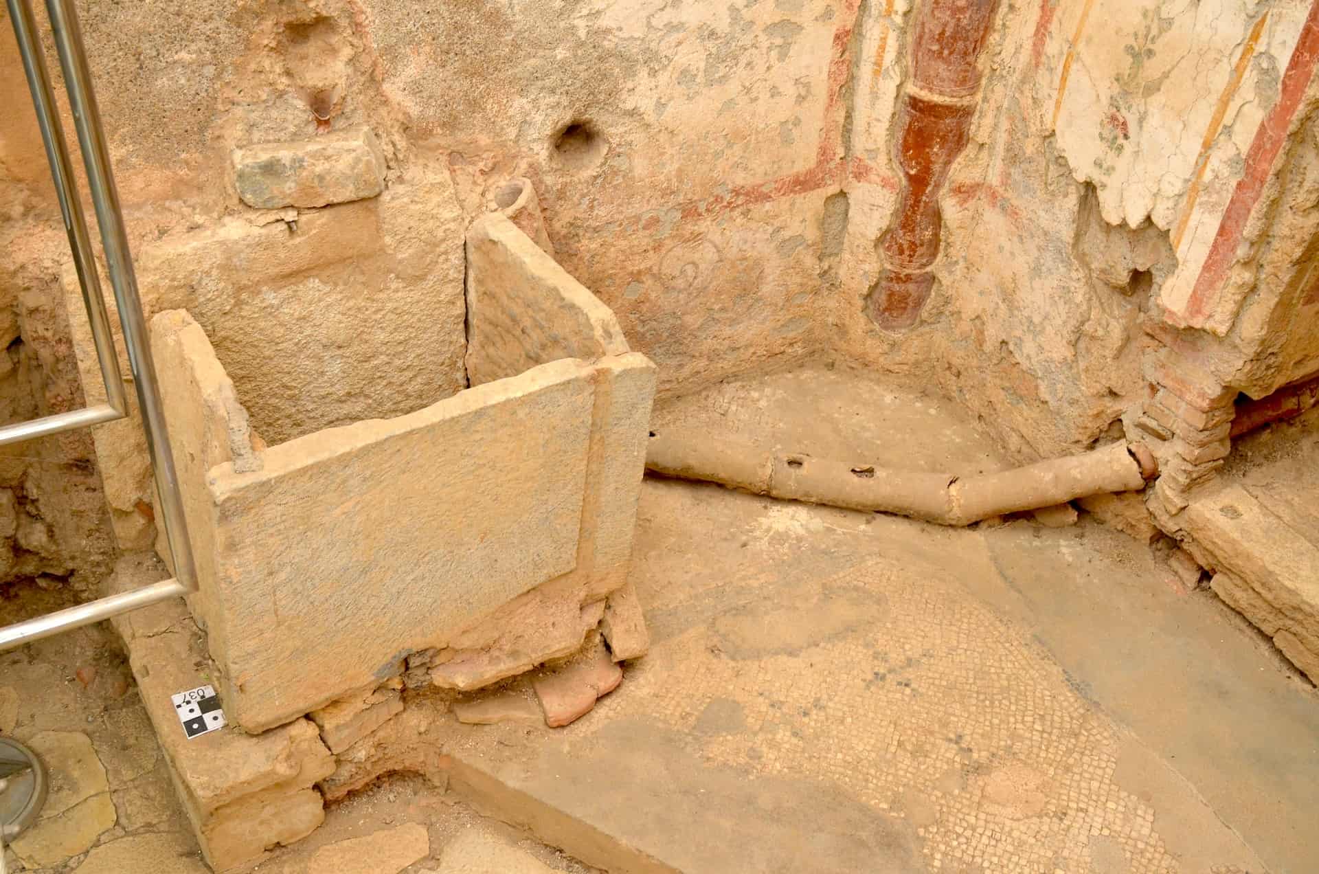 Wash basin and pipes in the latrine in Dwelling Unit 2 in the Terrace Houses at Ephesus