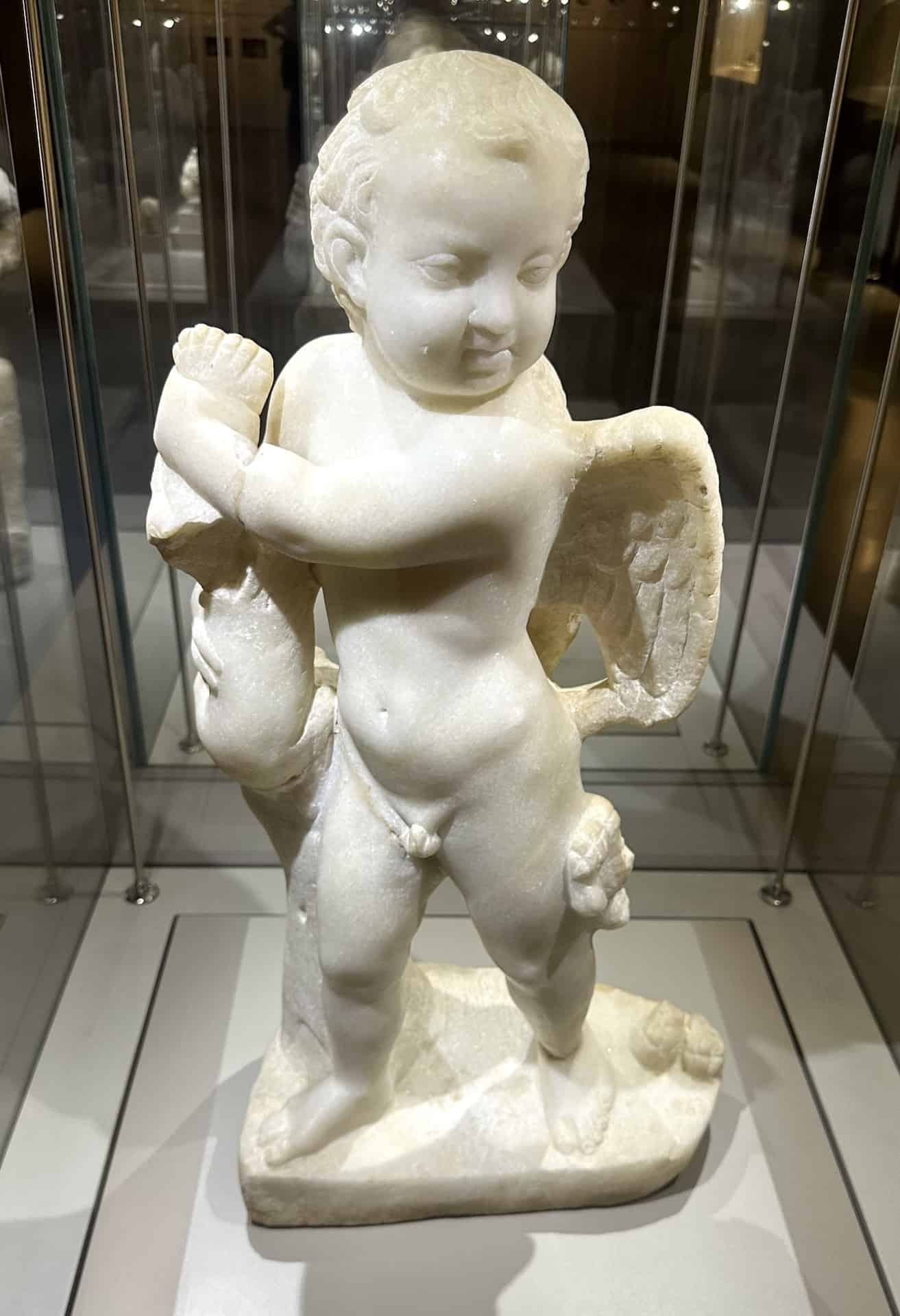 Statue of Eros with a rabbit (2nd-3rd century) in Ephesus Through the Ages at the Ephesus Museum in Selçuk, Turkey