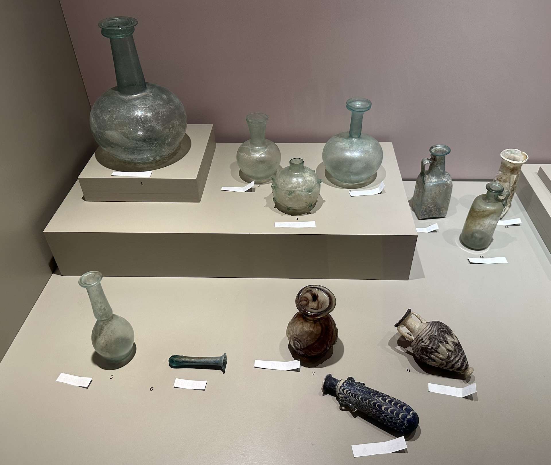 Glass bottles (1st century BC to 4th century AD) in Ephesus Through the Ages at the Ephesus Museum in Selçuk, Turkey