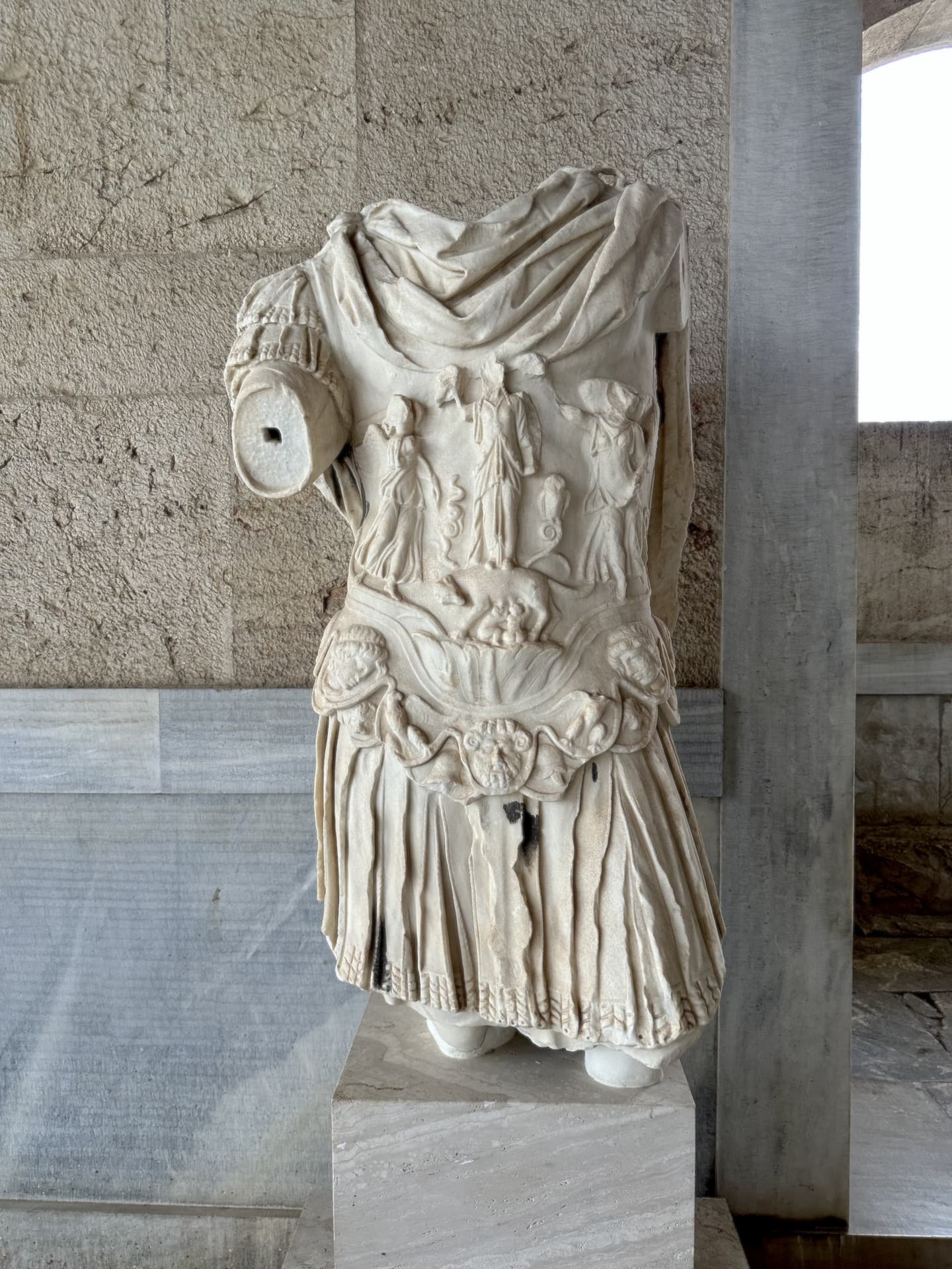 Statue of the emperor Hadrian with cuirass showing Athena and the Wolf of Rome