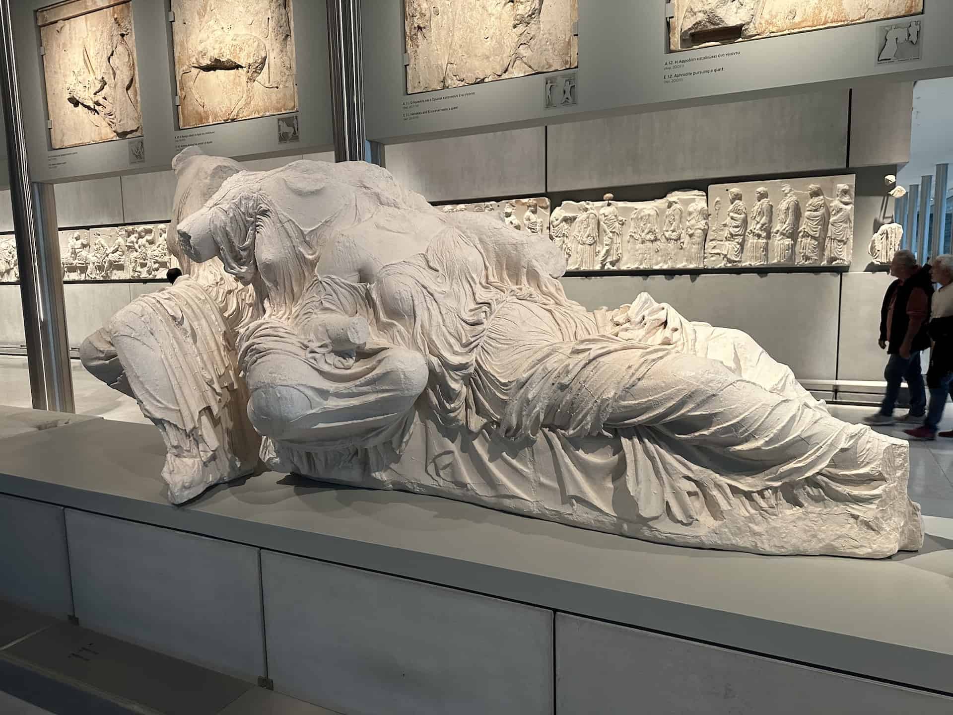 Dione (or Artemis) and Aphrodite (in the British Museum) on the east pediment of the Parthenon at the Acropolis Museum in Athens, Greece