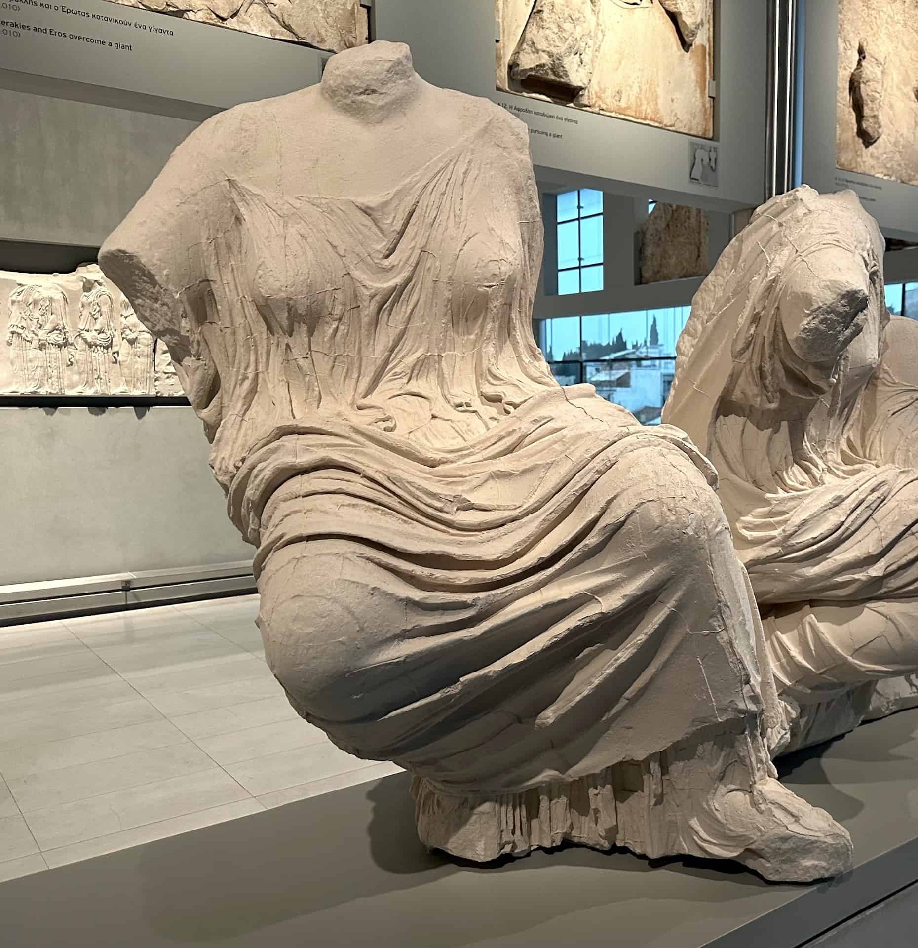Hestia (or Leto) (in the British Museum) on the east pediment of the Parthenon at the Acropolis Museum in Athens, Greece