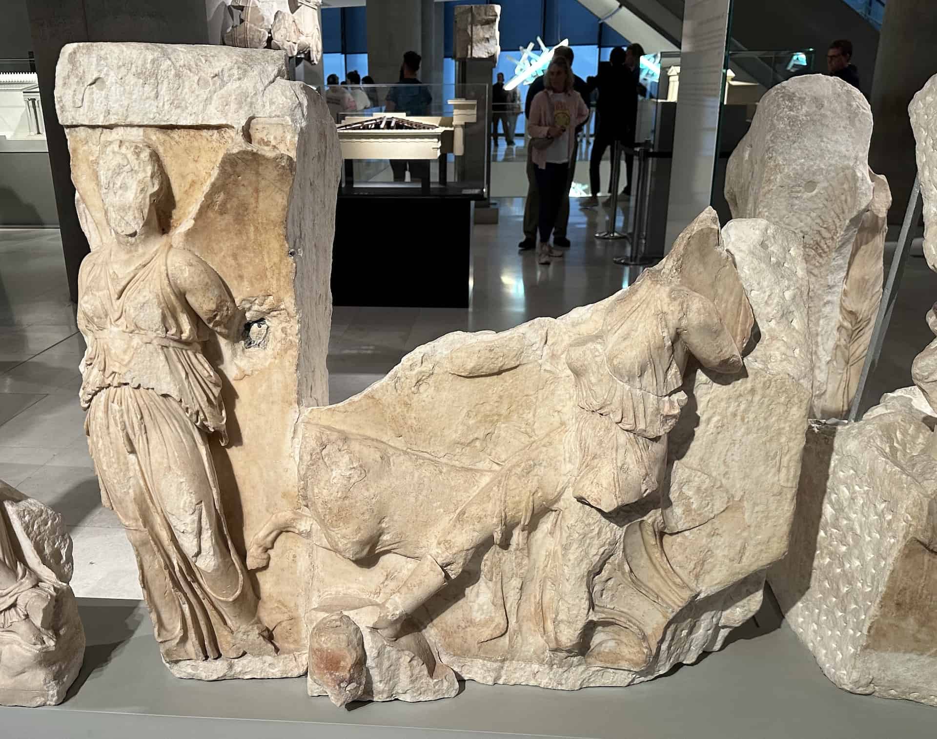 Two Nikai leading a bull to sacrifice on the parapet of the Temple of Athena Nike