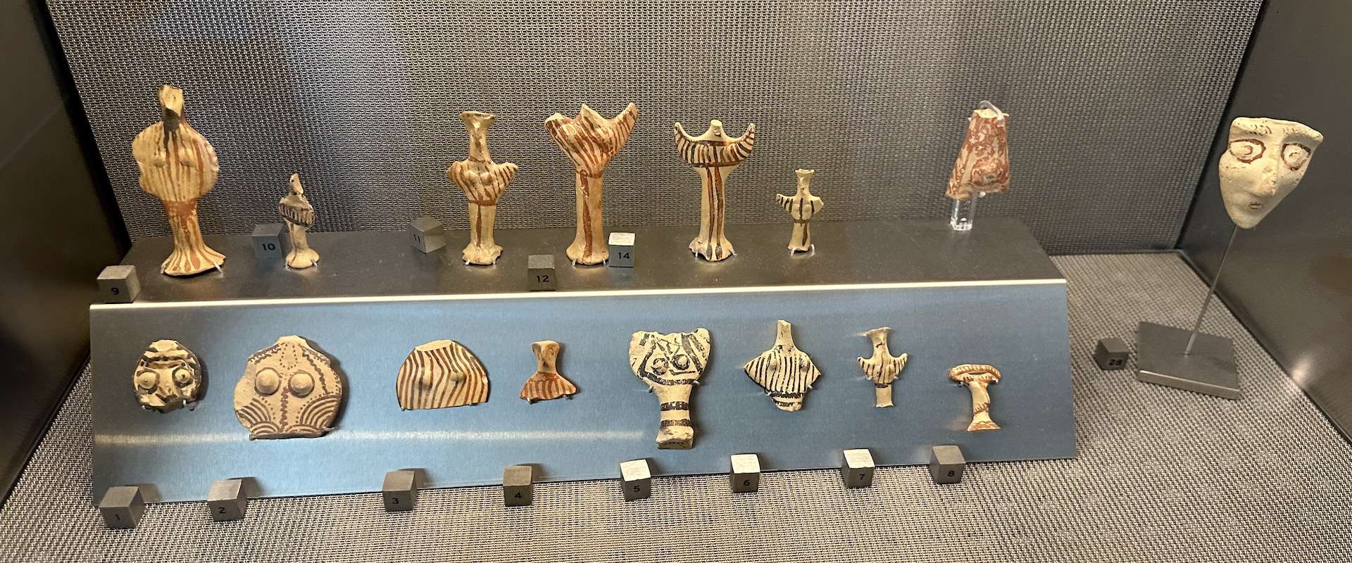 Mycenaean figurines and seals; 1400-1050 BC at the Acropolis Museum in Athens, Greece