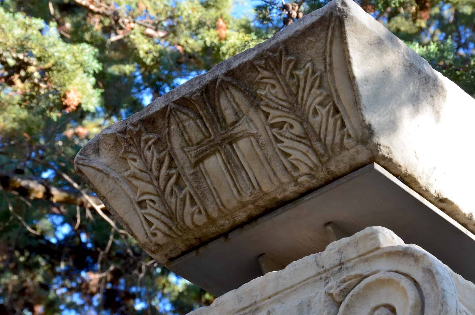 5th century column capital in the Byzantine Church in the Paradise exhibit in the gardens at Villa Ilissia