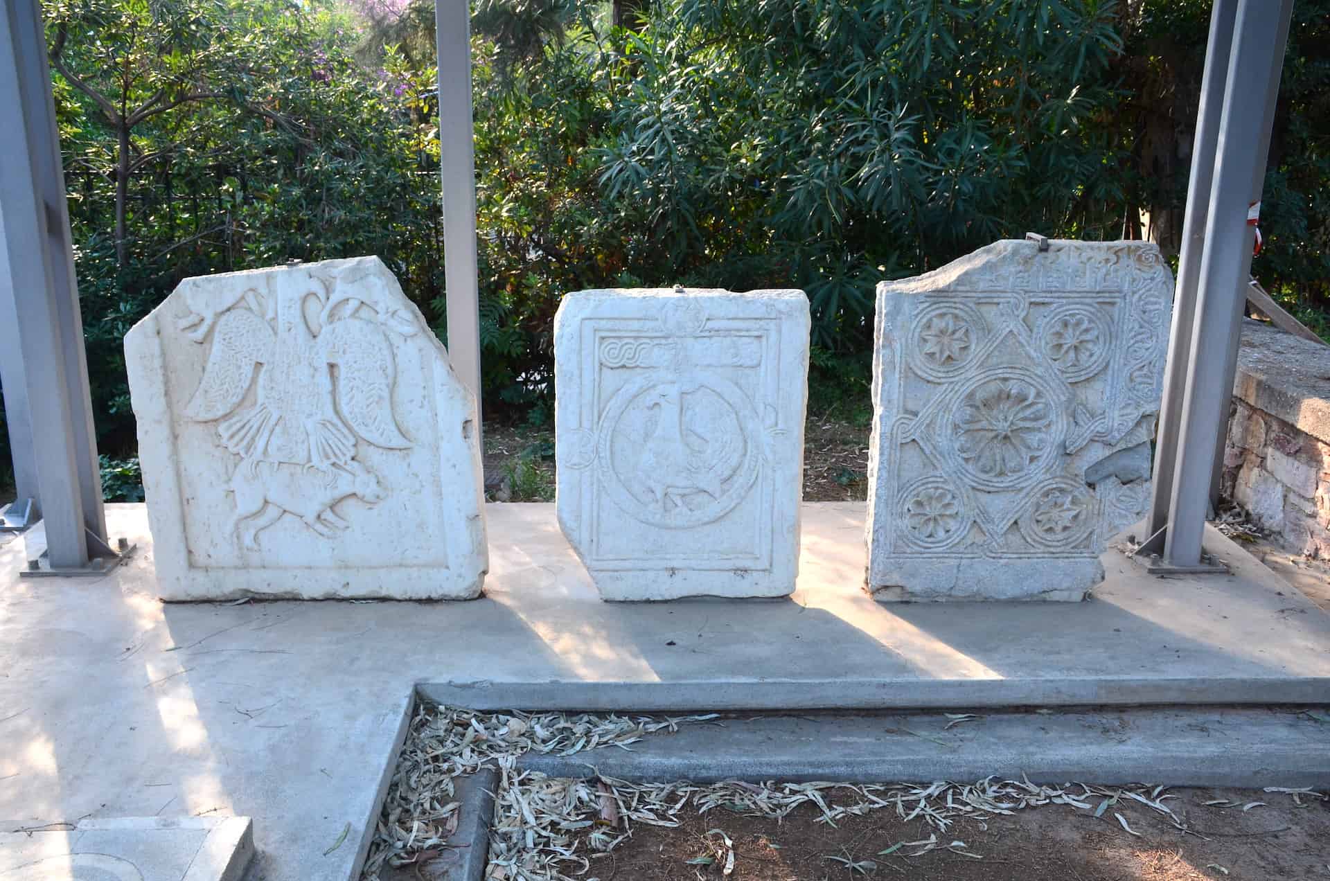 11th century closure slabs in the Byzantine Church in the Paradise exhibit in the gardens at Villa Ilissia (Byzantine Museum) in Athens, Greece