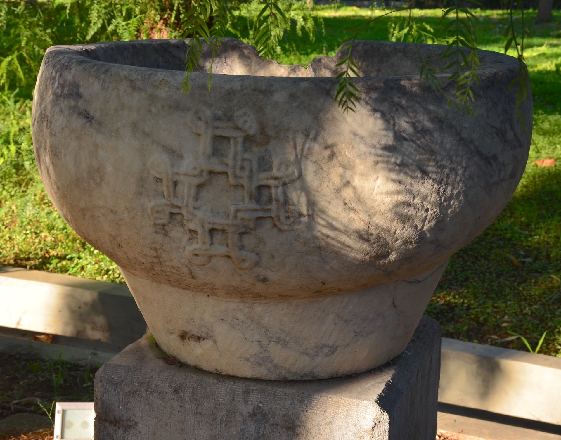 Holy water font from the Church of Holy Apostles in the Ancient Agora of Athens, late 10th century in the Paradise exhibit in the gardens at Villa Ilissia (Byzantine Museum) in Athens, Greece