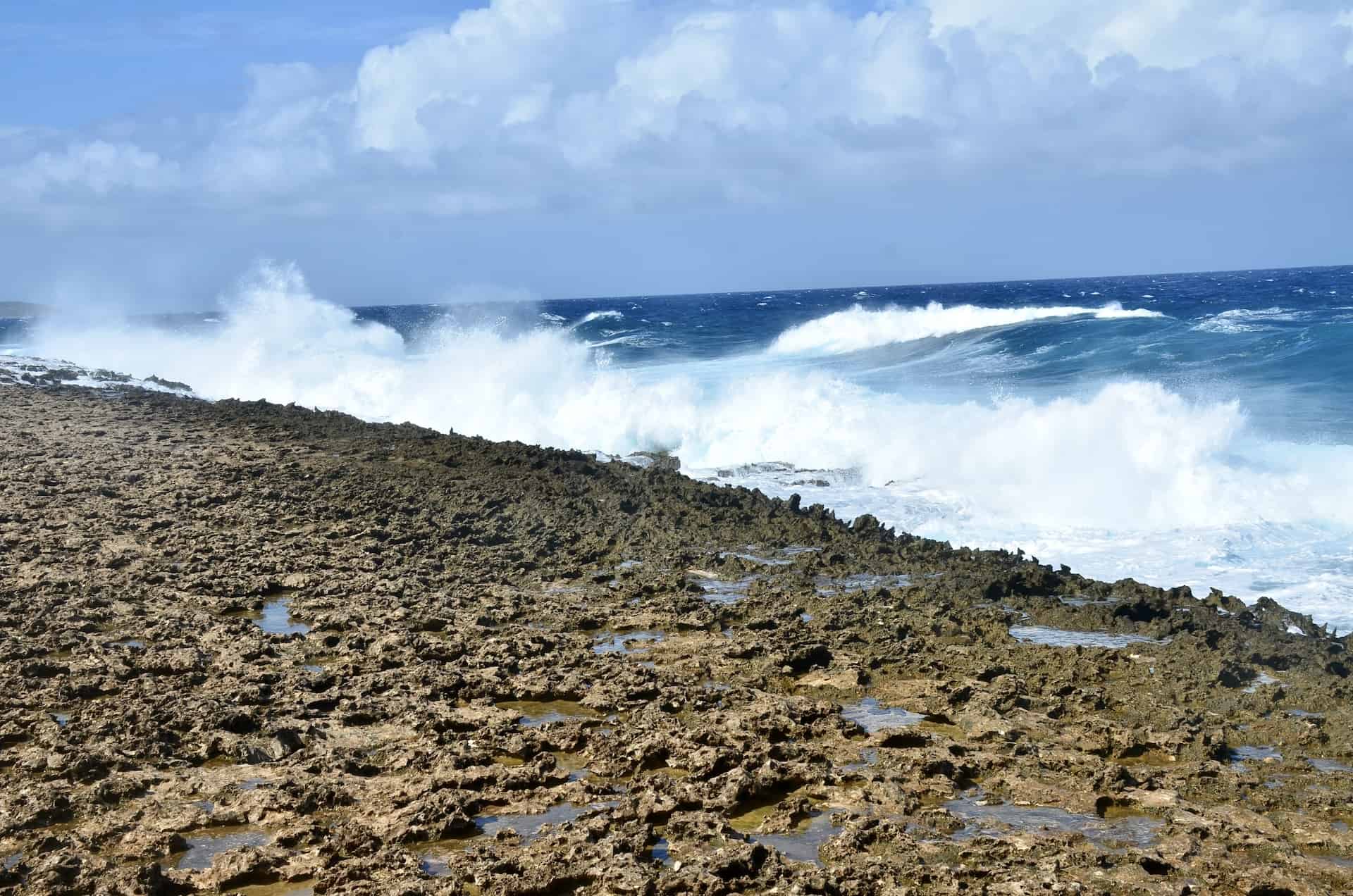 Waves hitting the rocks at the Bushiribana Gold Mill ruins in Paradera, Aruba