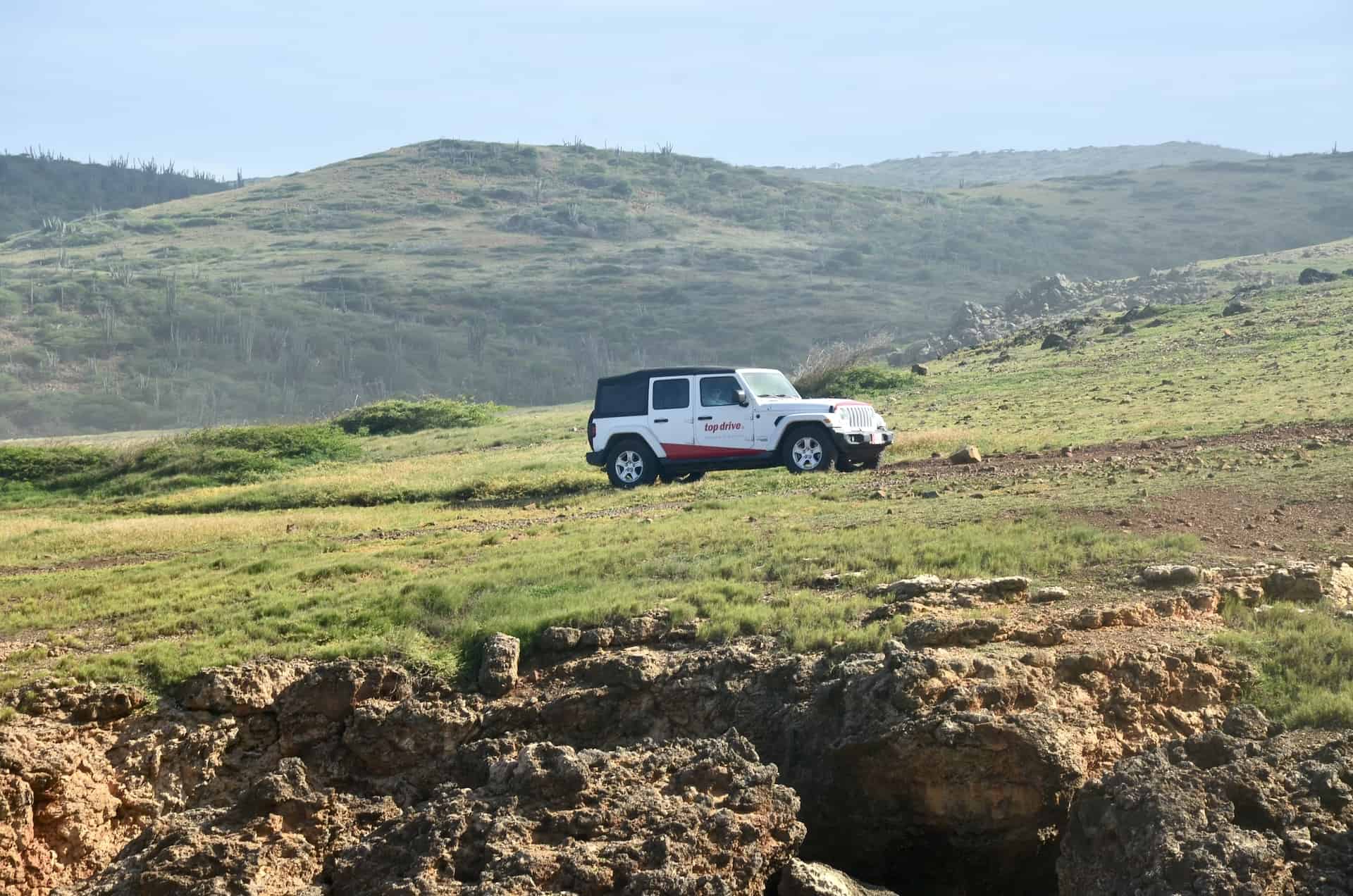 Jeep on the 4x4 trail at Natural Bridge in Paradera, Aruba