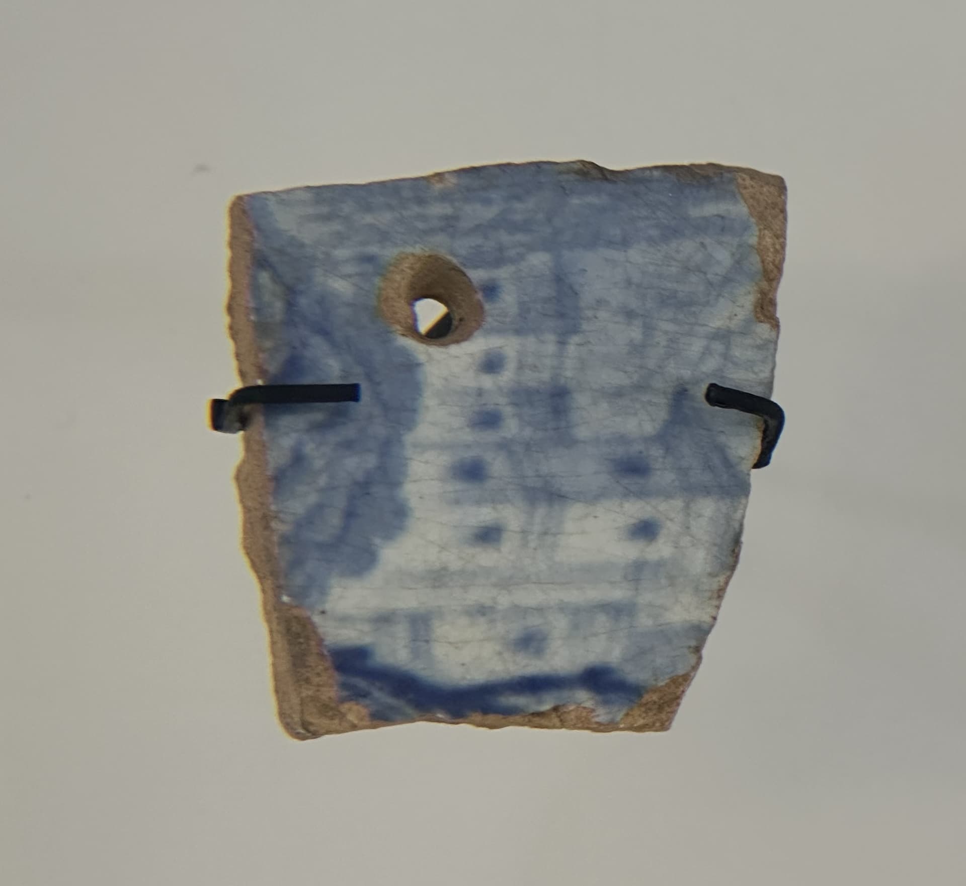 Ceramic pendant from the Historic period at the National Archaeological Museum