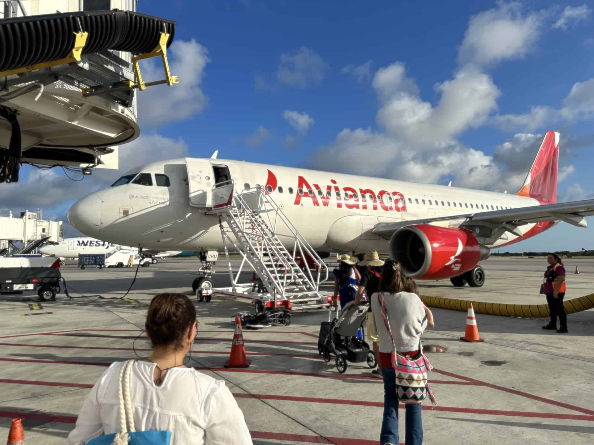 Boarding a plane at Queen Beatrix International Airport in Aruba
