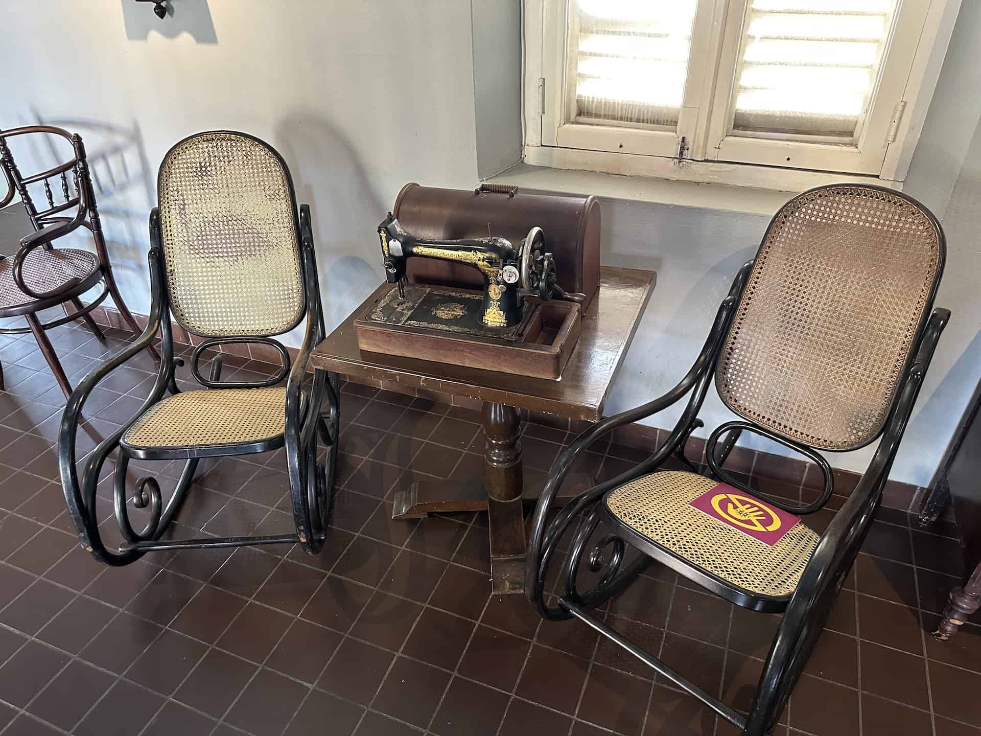 Sewing machine and rocking chairs at the Historical Museum of Aruba