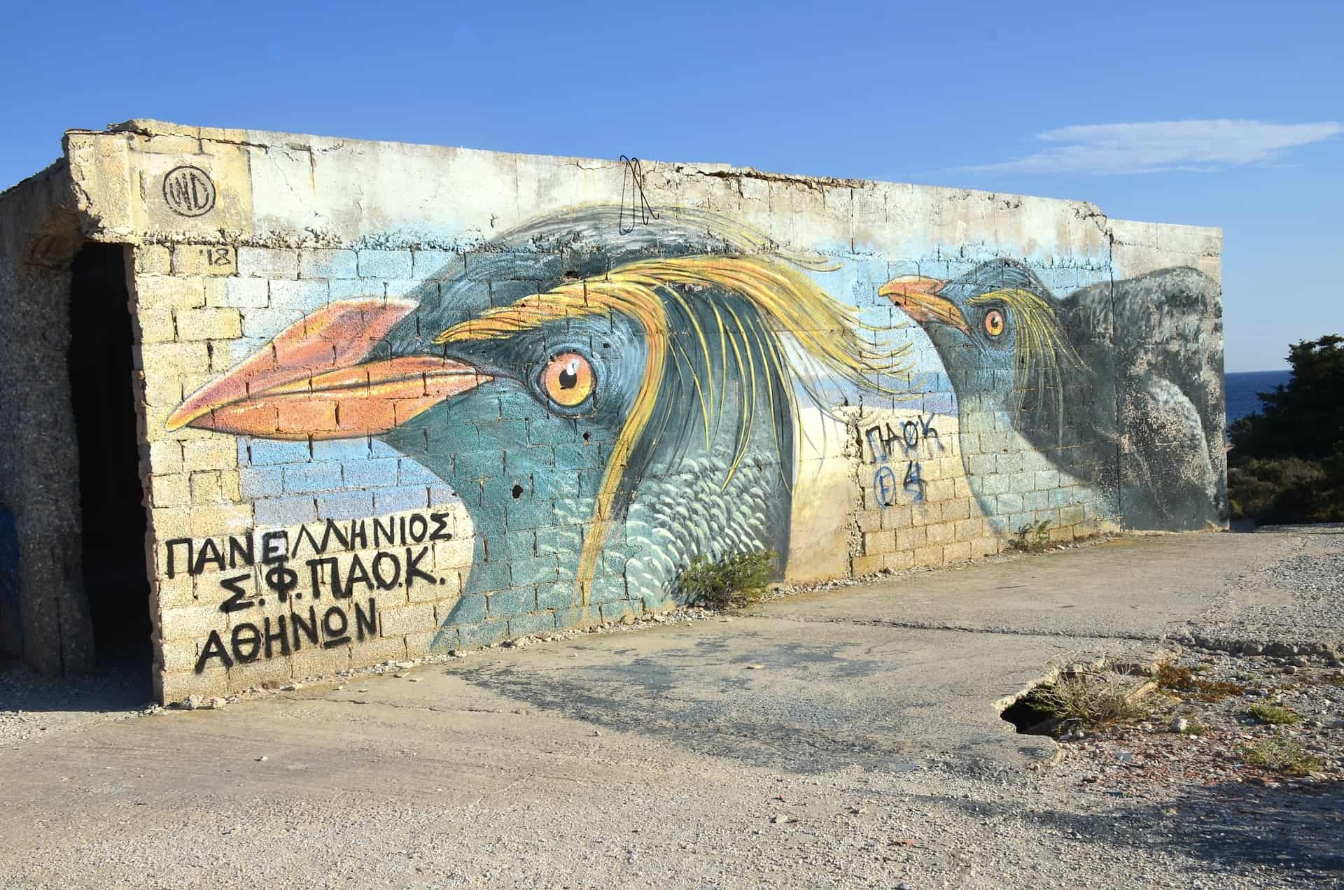 Bird mural at the unfinished hotel at Mikrolimano Beach, Naxos, Greece