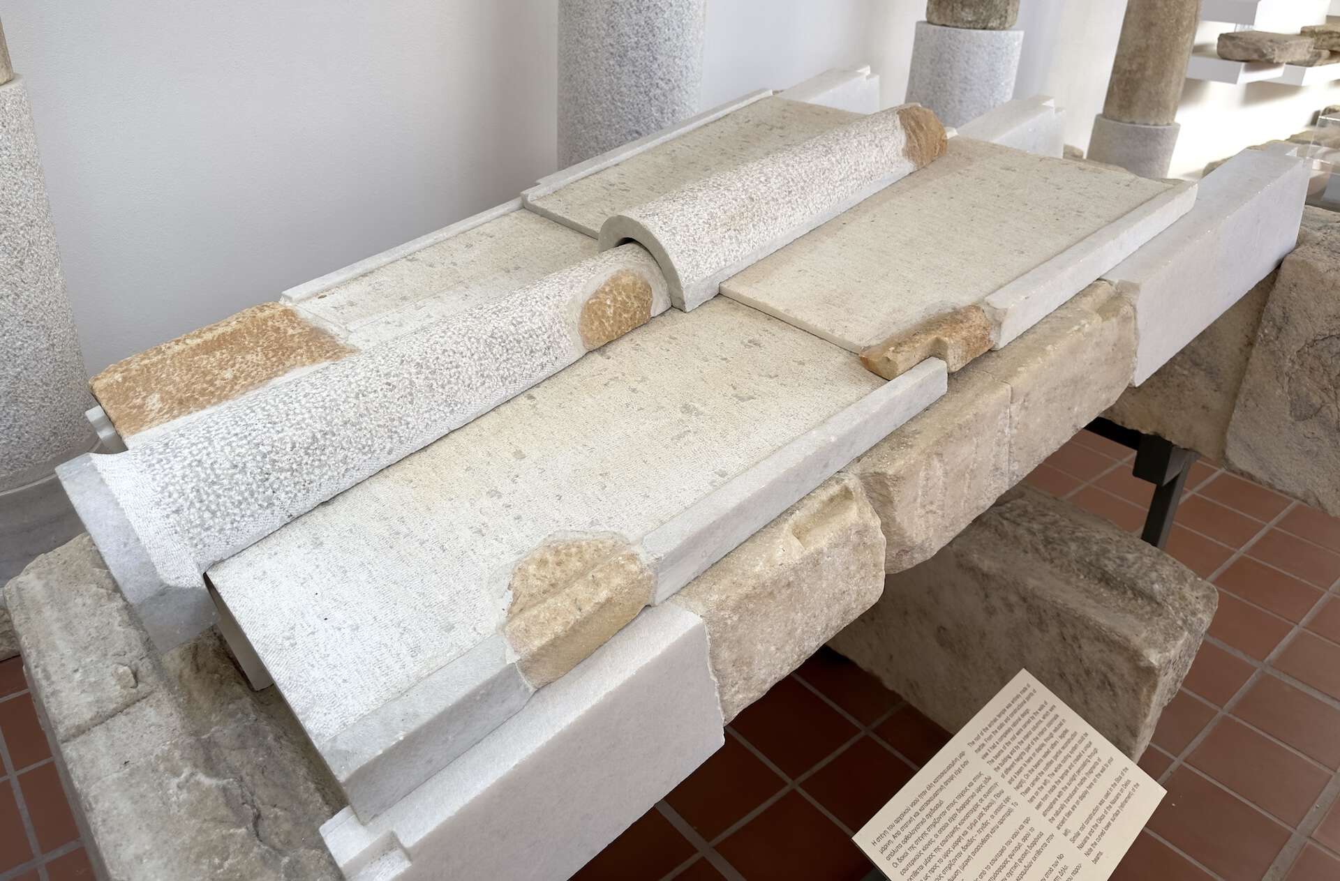 Marble roof tiles and beams in the museum at the Temple of Demeter in Naxos, Greece