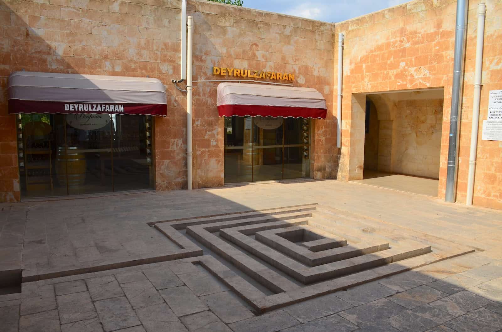 Courtyard with a wine shop at Mor Hananyo