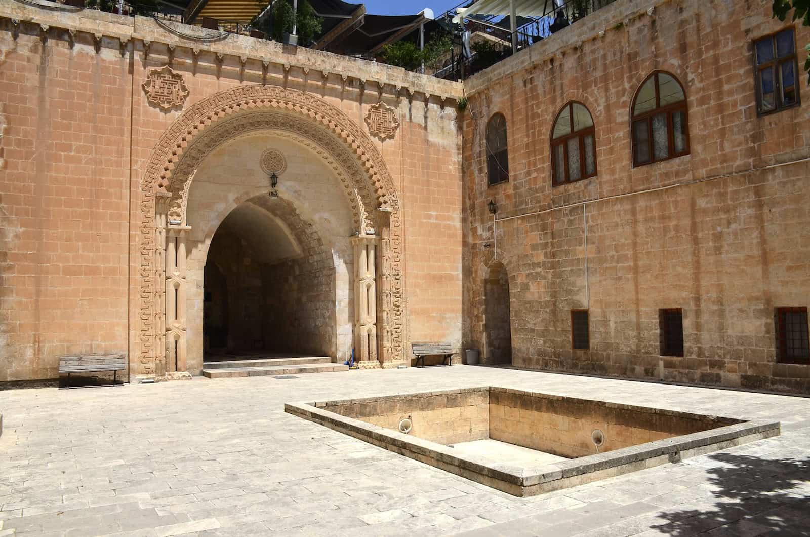 Niche with the fountain and pool in the center of the courtyard of the Şehidiye Madrasa in Mardin, Turkey