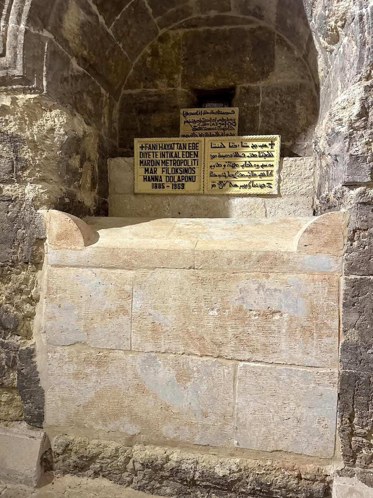 Grave of Metropolitan Filoksinos of Mardin (1885-1969) at the inner courtyard at Mor Hananyo