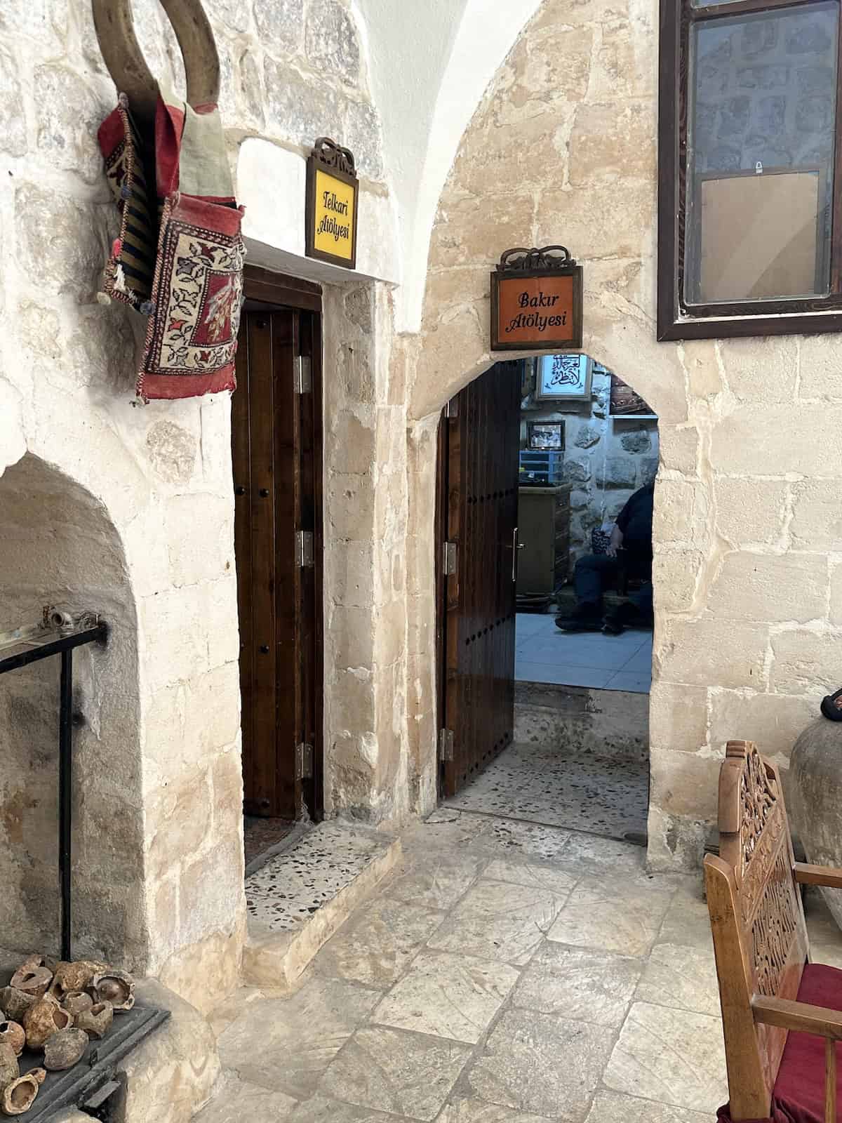 Entrances to the filigree workshop (left) and coppersmith workshop (right)